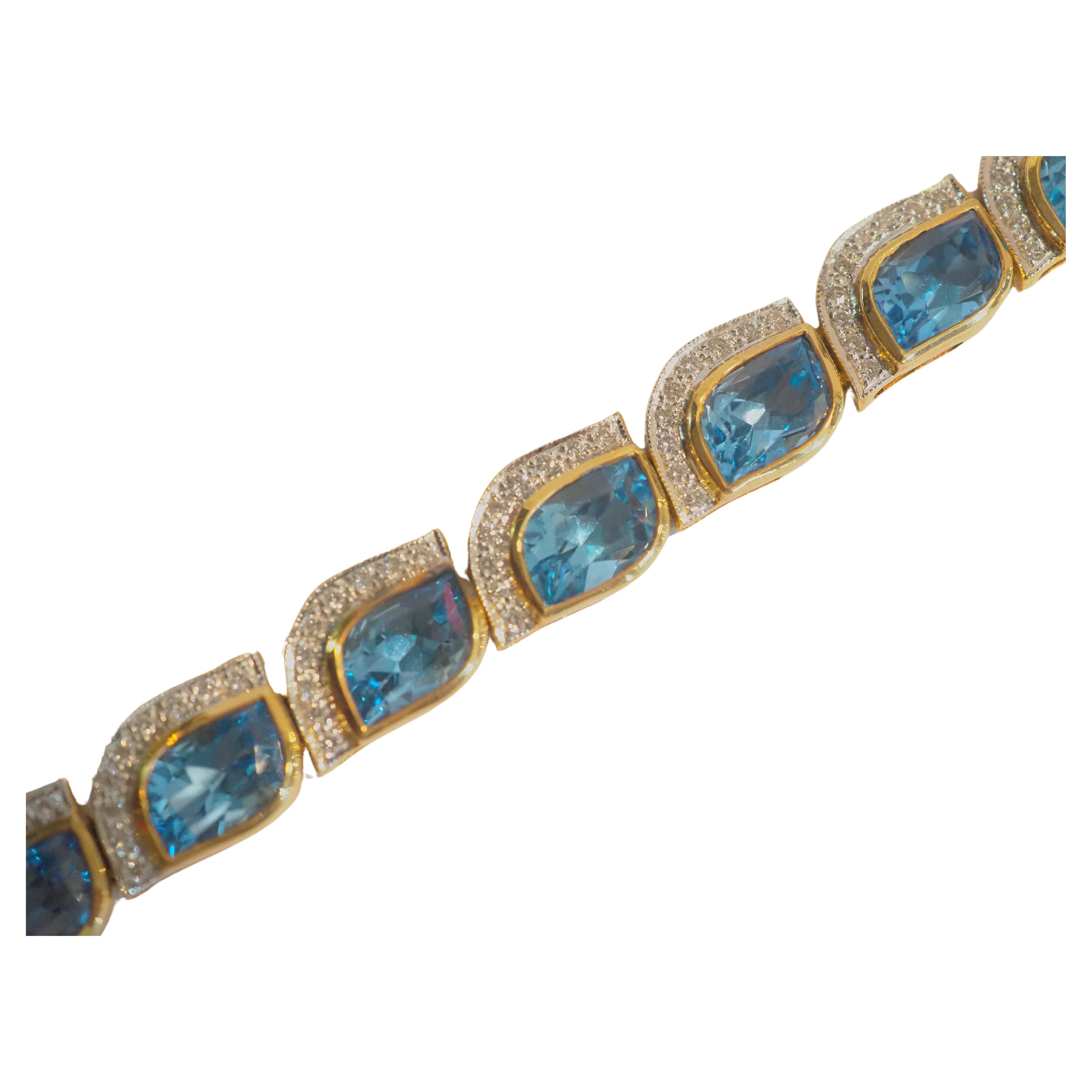 18K Gold 30.16 Carat Mixed Cut Blue Topaz & 1.41ct Diamond Bracelet For Sale