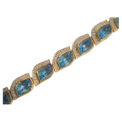 18K Gold 30.16 Carat Mixed Cut Blue Topaz & 1.41ct Diamond Bracelet