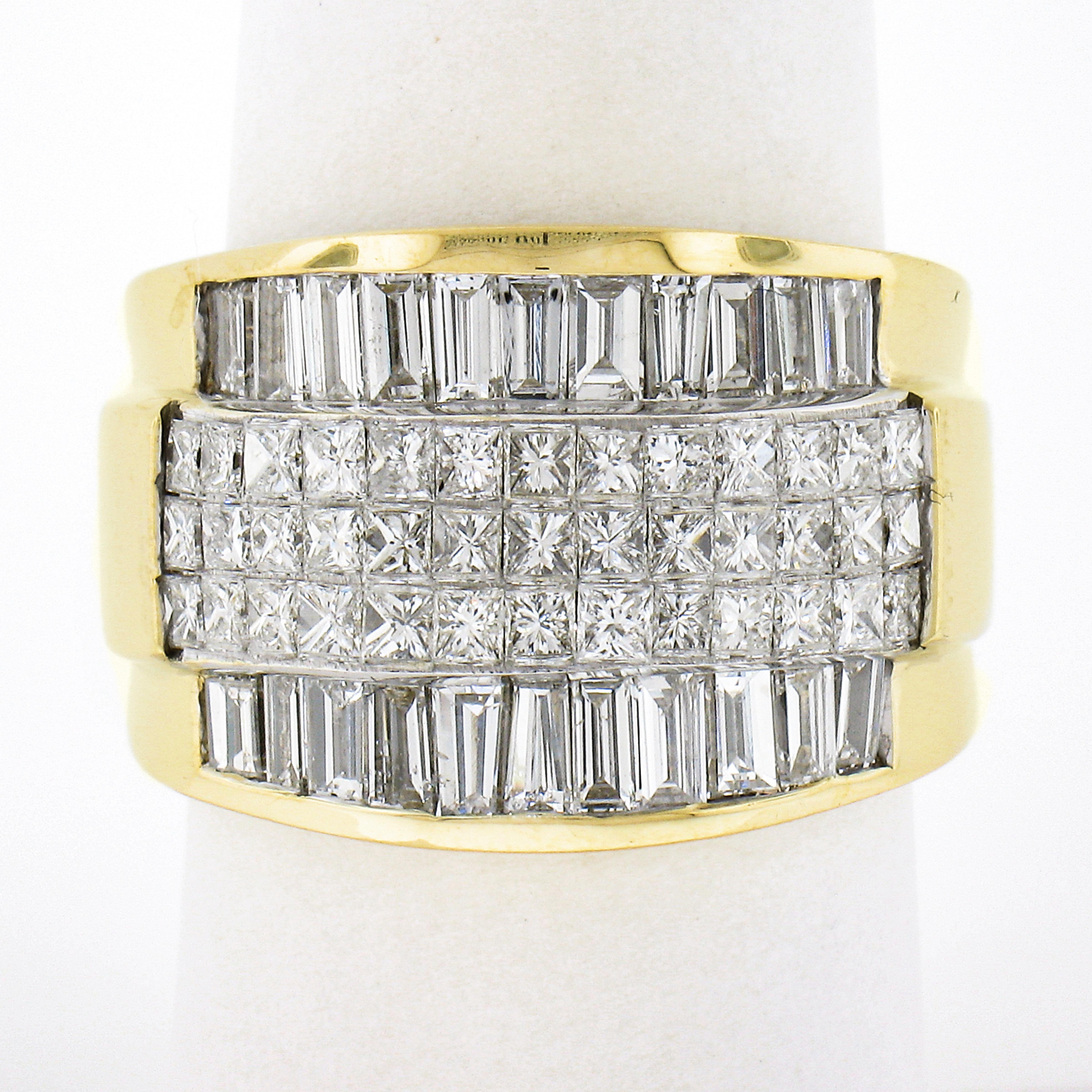 This stunning and very well made diamond band ring is crafted from solid 18k yellow gold and features approximately 3.08 carats of very fine quality diamonds throughout its top. The center displays 3 rows of 39 princess cut diamonds that are