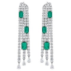 3.2 Cts. Octagon Emerald & 6 Cts. Diamond Dangle Earrings in 18K White Gold 