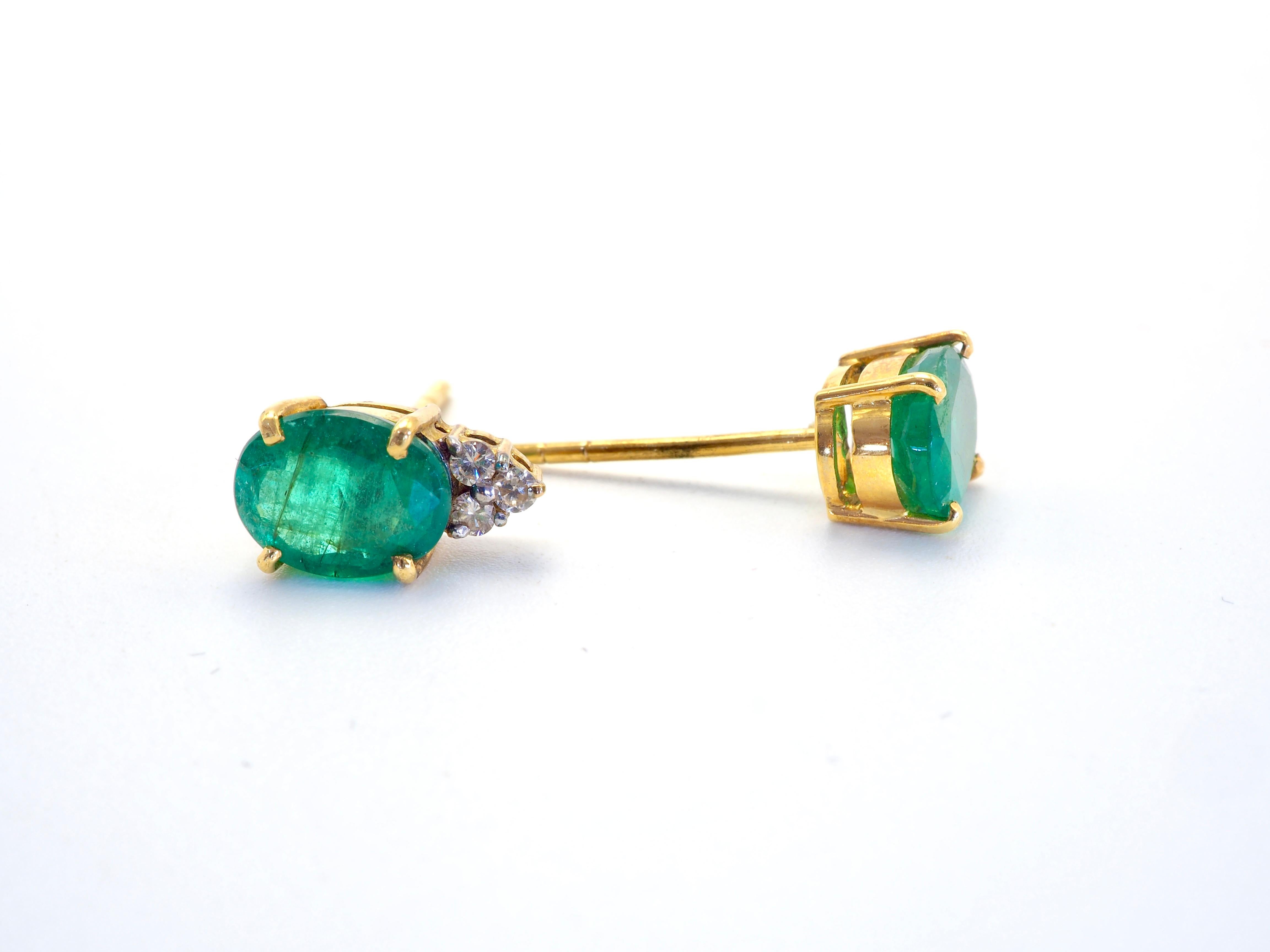 Lovely vivid green emerald with blue tint and diamond stud earrings for wear during special occasions. The oval emeralds are of medium tone green color with high saturation and bluish tint and natural inclusions is visible with some nicks present.