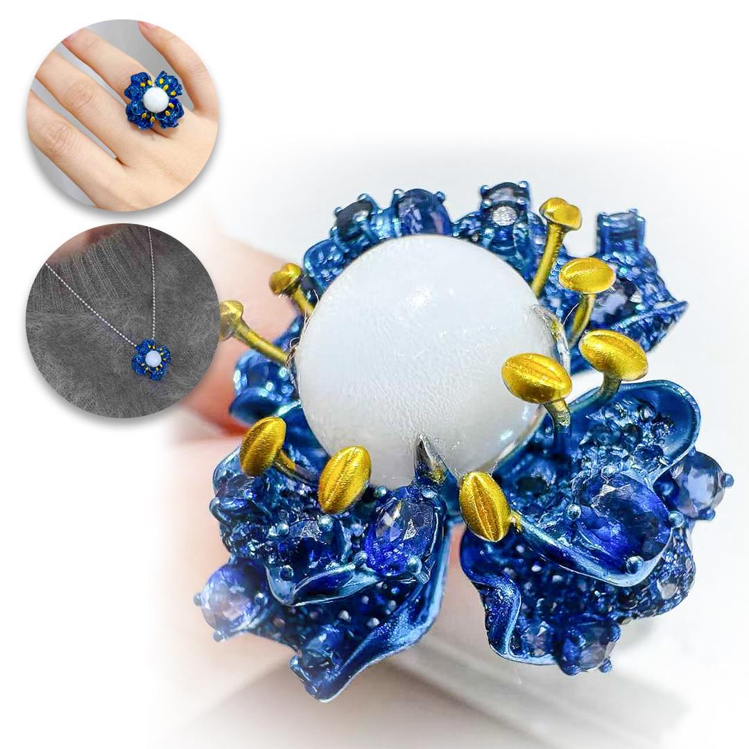 This magnificent jewelry piece celebrates versatility and artistry, designed to be worn as a ring, pendant, or brooch. At its core lies a rare, natural, wild, large Hag Stone, showcasing a unique, organic texture and a radiant white glow that evokes