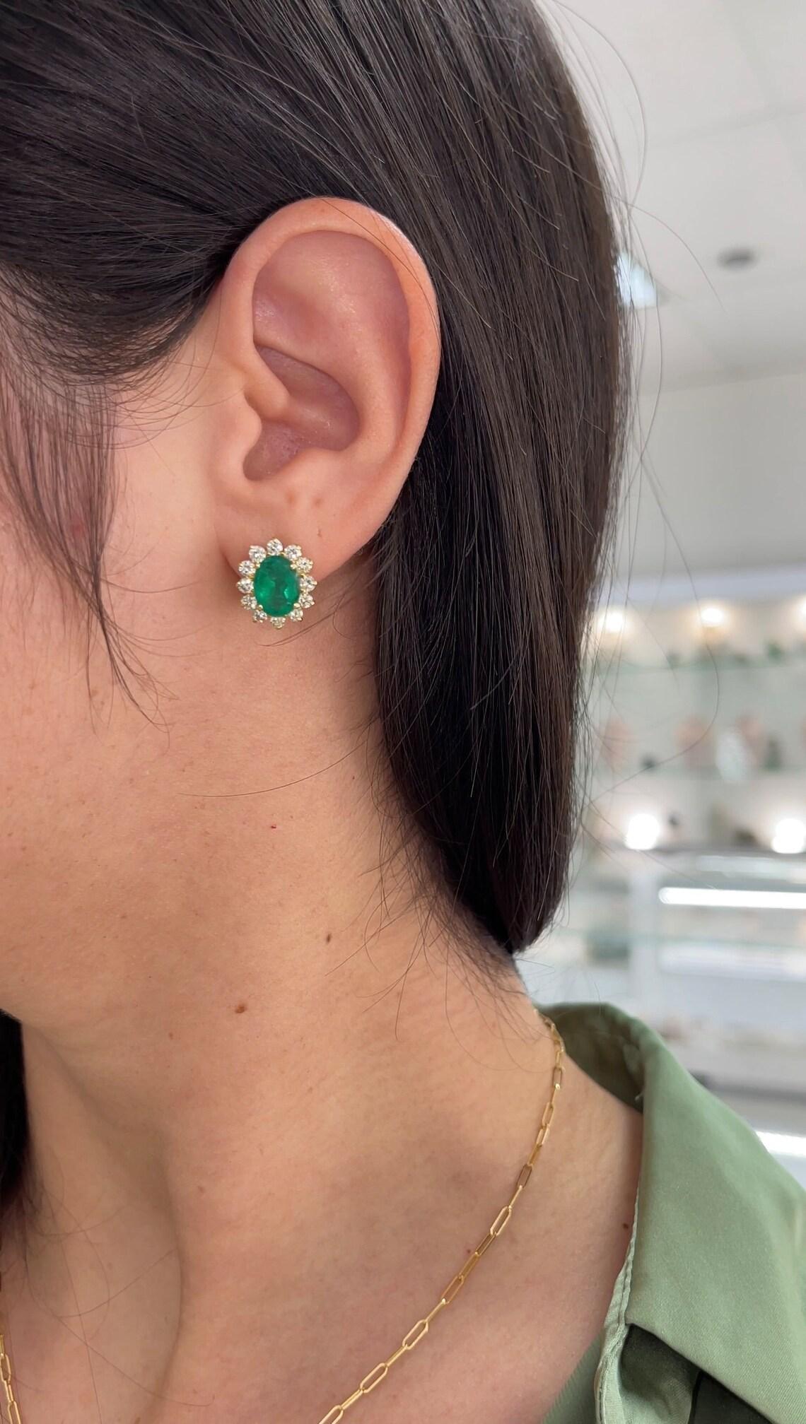 Modern 18K Gold 6.60tcw Fine Colombian Emerald & Diamond Halo Earrings Dark Green Oval For Sale