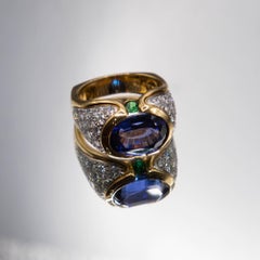 18k Gold/ 6.80ct. Fine Tanzanite Oval/ Tsavorite Garnet 0.50ct/ Diamonds 2.24cts