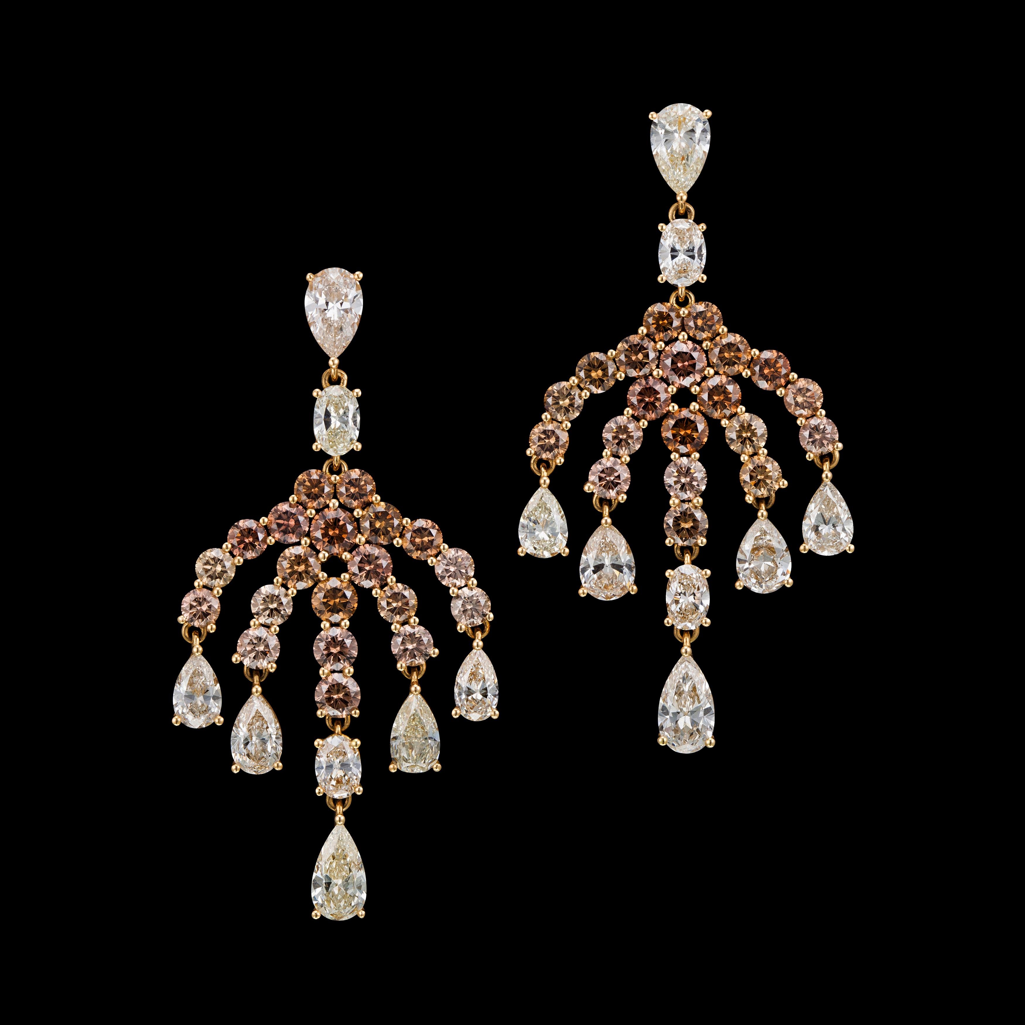 A chandelier fancy brown diamond and white diamond earrings in 18k gold.
hanging dress earrings.