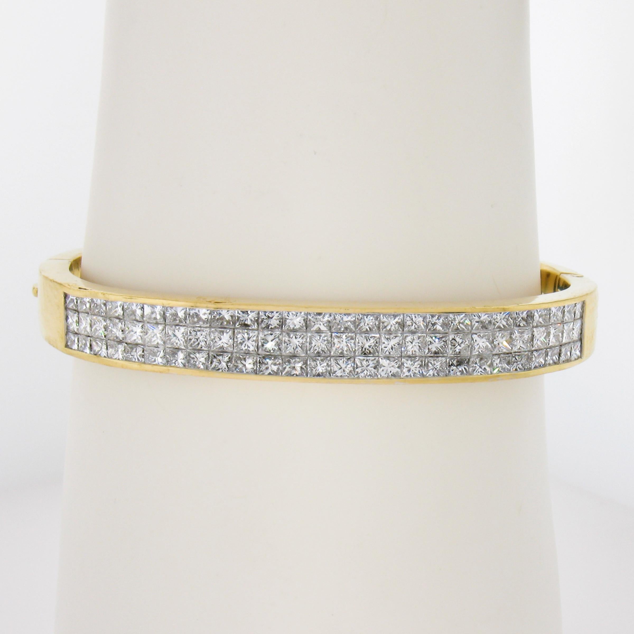 --Stone(s):--
(78) Natural Genuine Diamonds - Princess Cut - Invisible Channel Set - F/G Color - VS1/VS2 Clarity
Total Carat Weight:	6 (approx.)

Material: 18K Solid Yellow Gold
Weight: 37.91 Grams
Size: Fits up to a 7 inch wrist
Width: 8.4mm