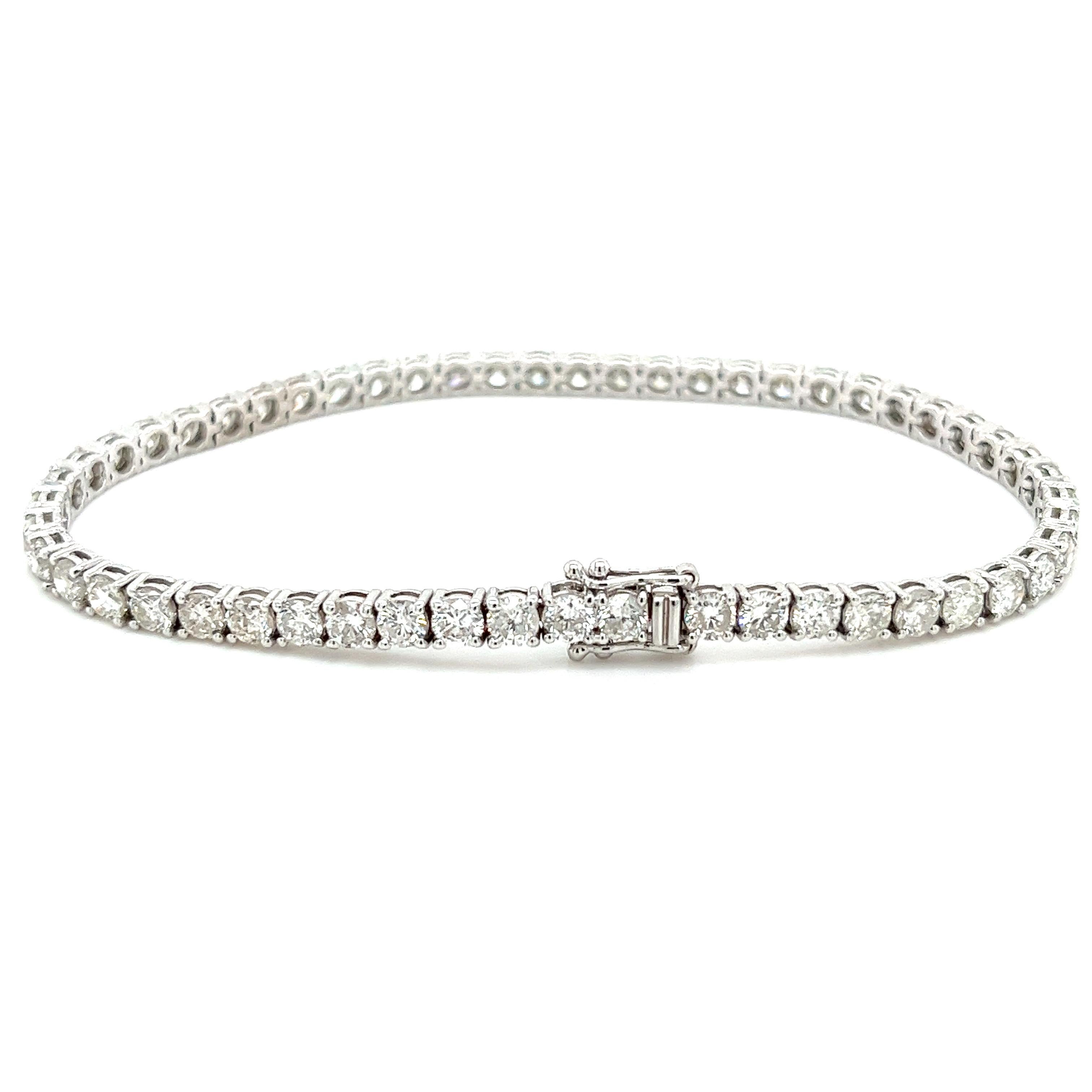 Get the natural diamond bracelet that you'll never want to take off. Hypoallergenic and waterproof.

The diamonds are eye clean, white, and full of life. 100% natural, mined stones. NOT cubic zirconia, diamond simulant, lab-grown, or