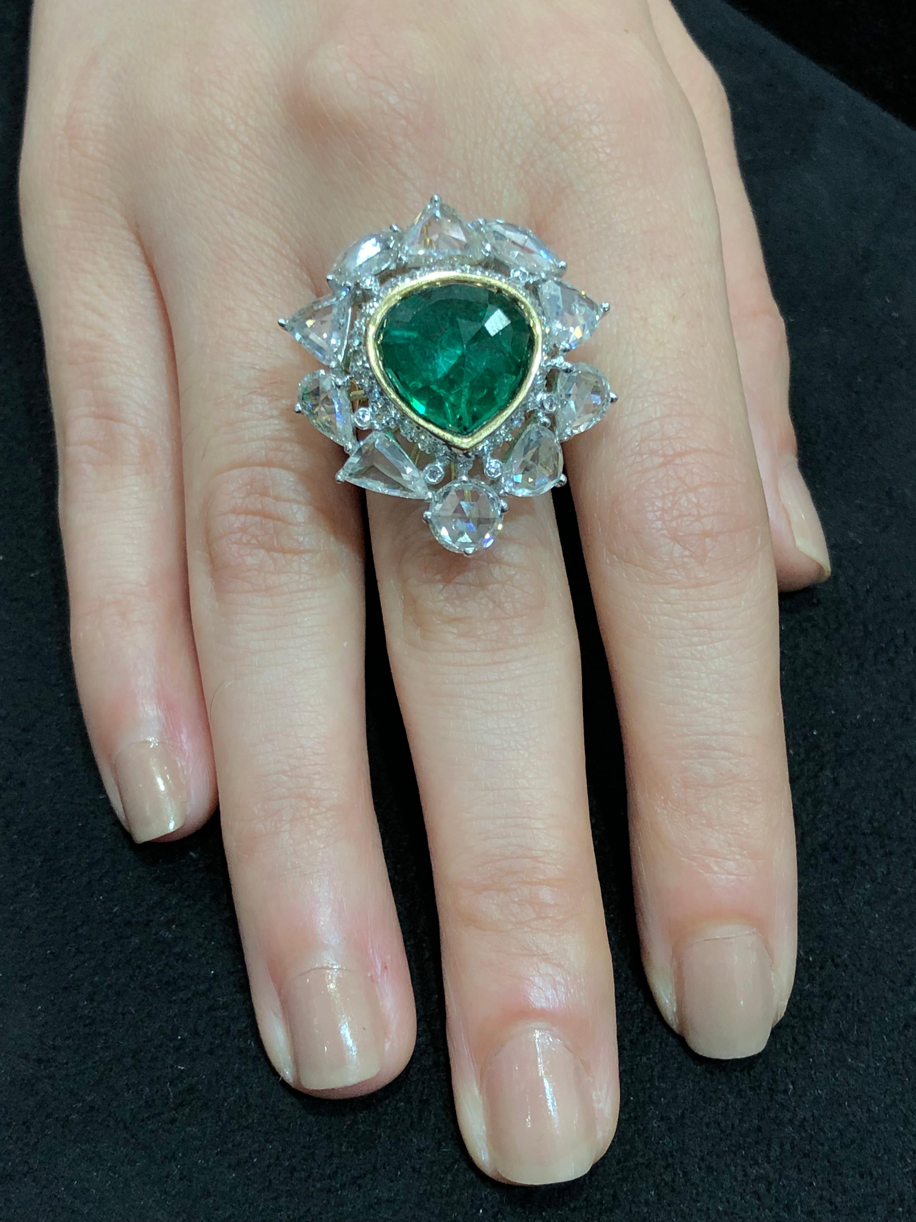 Diamonds: 6.88 carats
Emerald: 7.28 carats
18kt Gold: 10.518 grams
Ref No: DR-CEF

Undeniably, the best pick for glittering night out, showcasing our rose-cut diamond rind with a rare Zambian emerald.