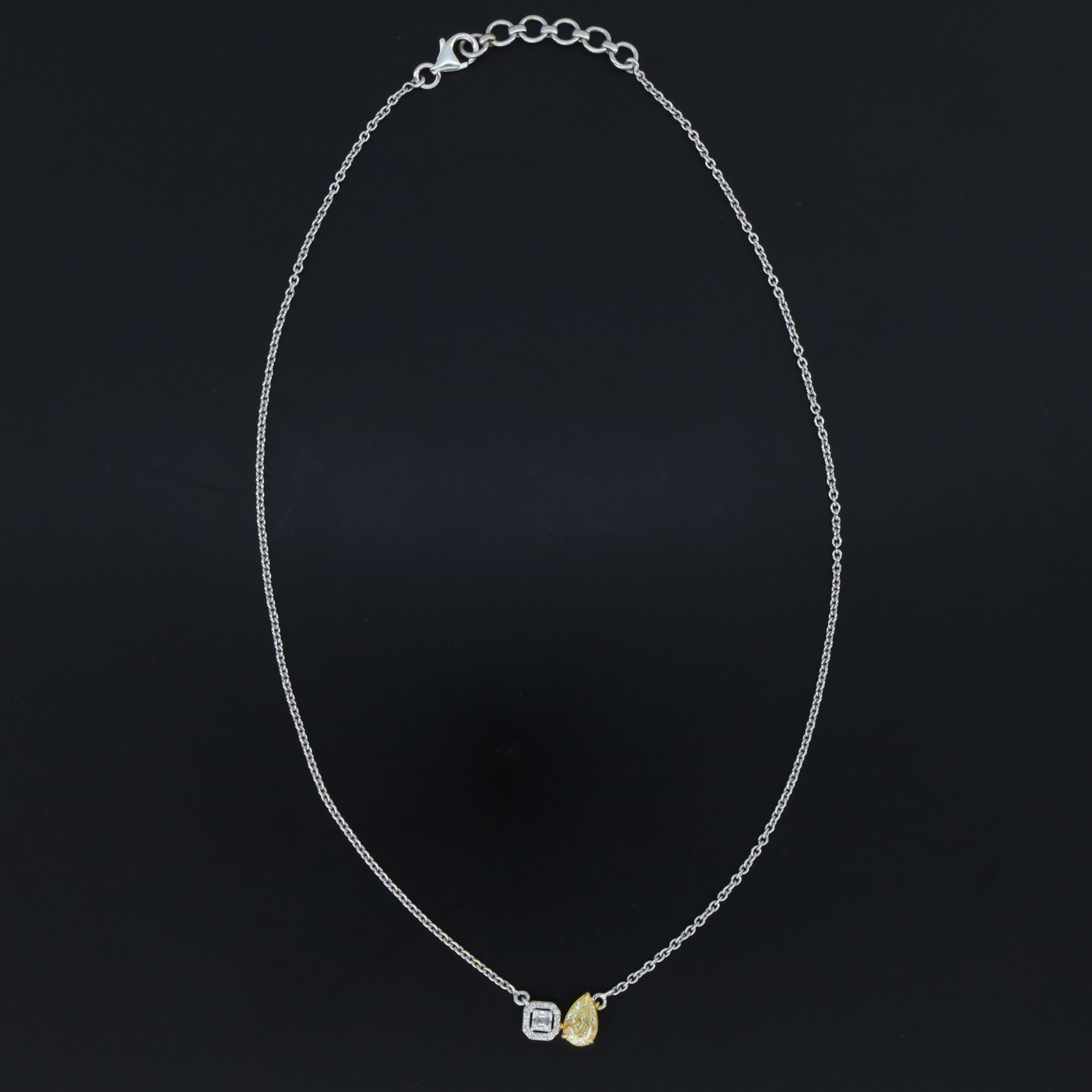 18k Gold .923 Karat Gelber Diamant Wei�ßer Diamant-Anhänger Halskette
Einzelstück Fancy Pear Cut Fancy Yellow Daimnd Vvs-Vs 1	0,750 Karat
16 Diamanten Weiß Rund D-F Vvs-Vs 	0,033 Karat
1 Stück Weißer Ascher Schliff Diamant D-F Vvs-Vs 1	0,140