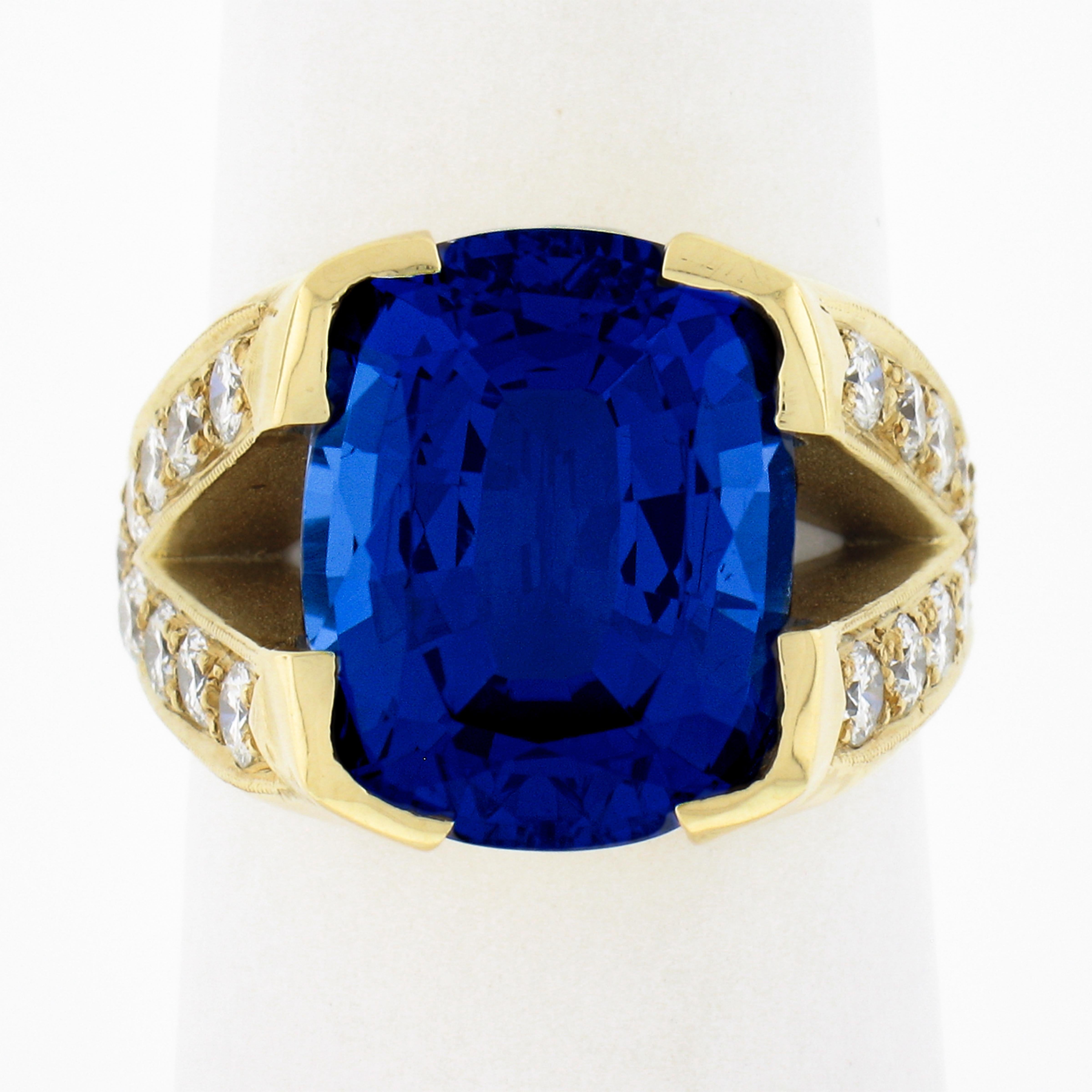 Here we have a truly jaw dropping and very well made cocktail ring that is crafted from solid 18k yellow gold. This special ring features a GIA certified natural tanzanite that is perfectly accented with numerous fiery diamonds arranged in a 