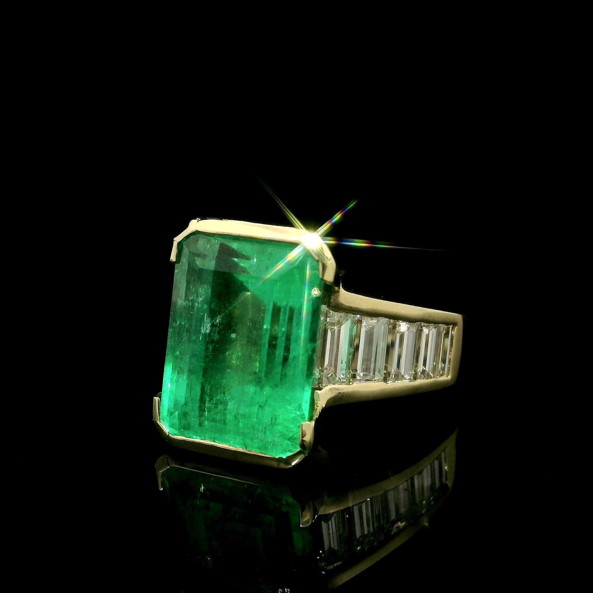 --Stone(s):--
(1) Natural Genuine Emerald - Emerald Cut - Half Bezel Channel Set - Very Nice Green Color - Colombian - Minor - 9.10ct (approx.)
** See Certification Details Below for Complete Info **
(10) Natural Genuine Diamonds - Straight Baguette