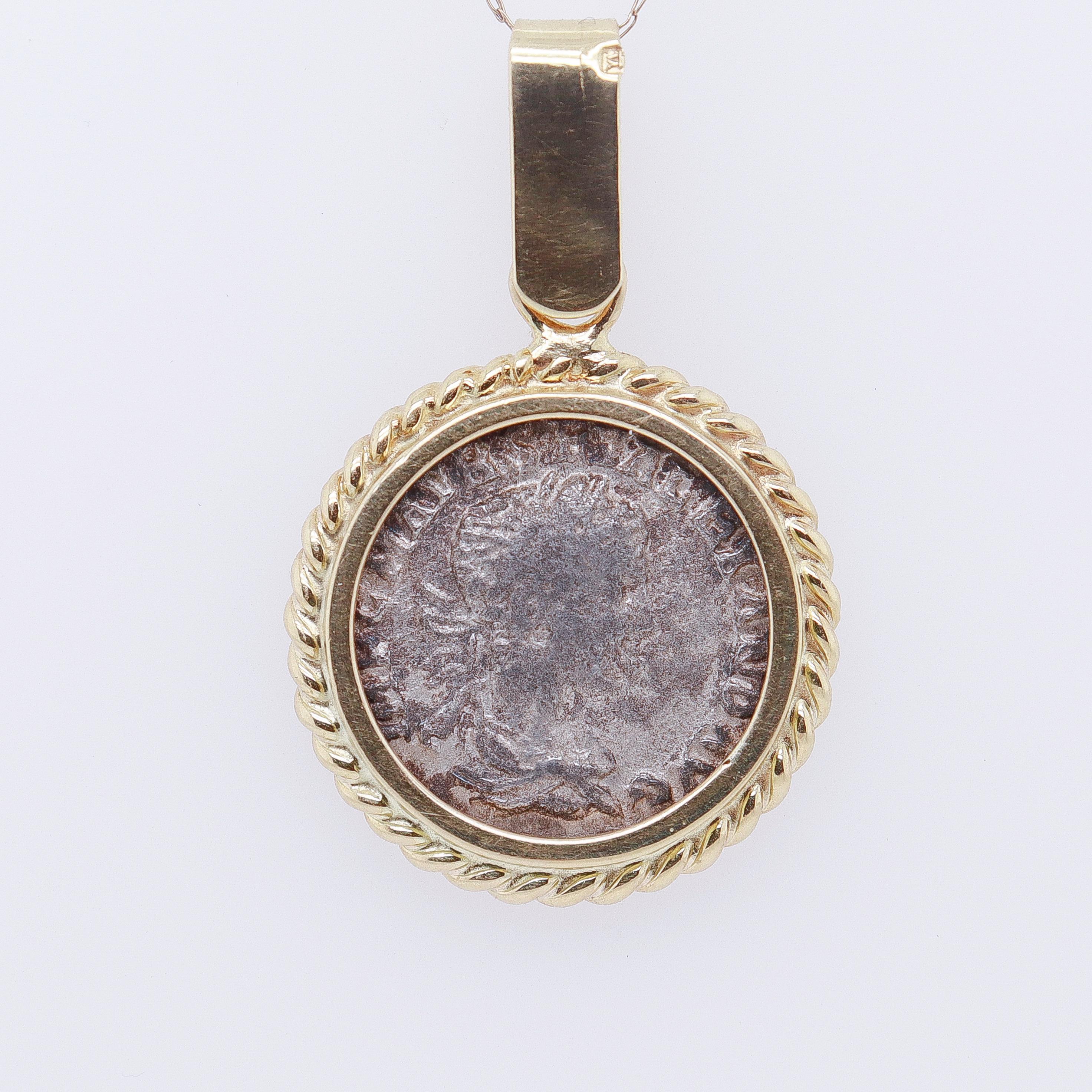 A fine ancient Roman coin pendant.

Set in 18k gold.

With rope twist bezel setting for the coin.

The coin is a silver Severus Alexander denarius (ca. 222 CE). 

With young Severus' face to the obverse. The reverse bears a seated Salus, the Roman