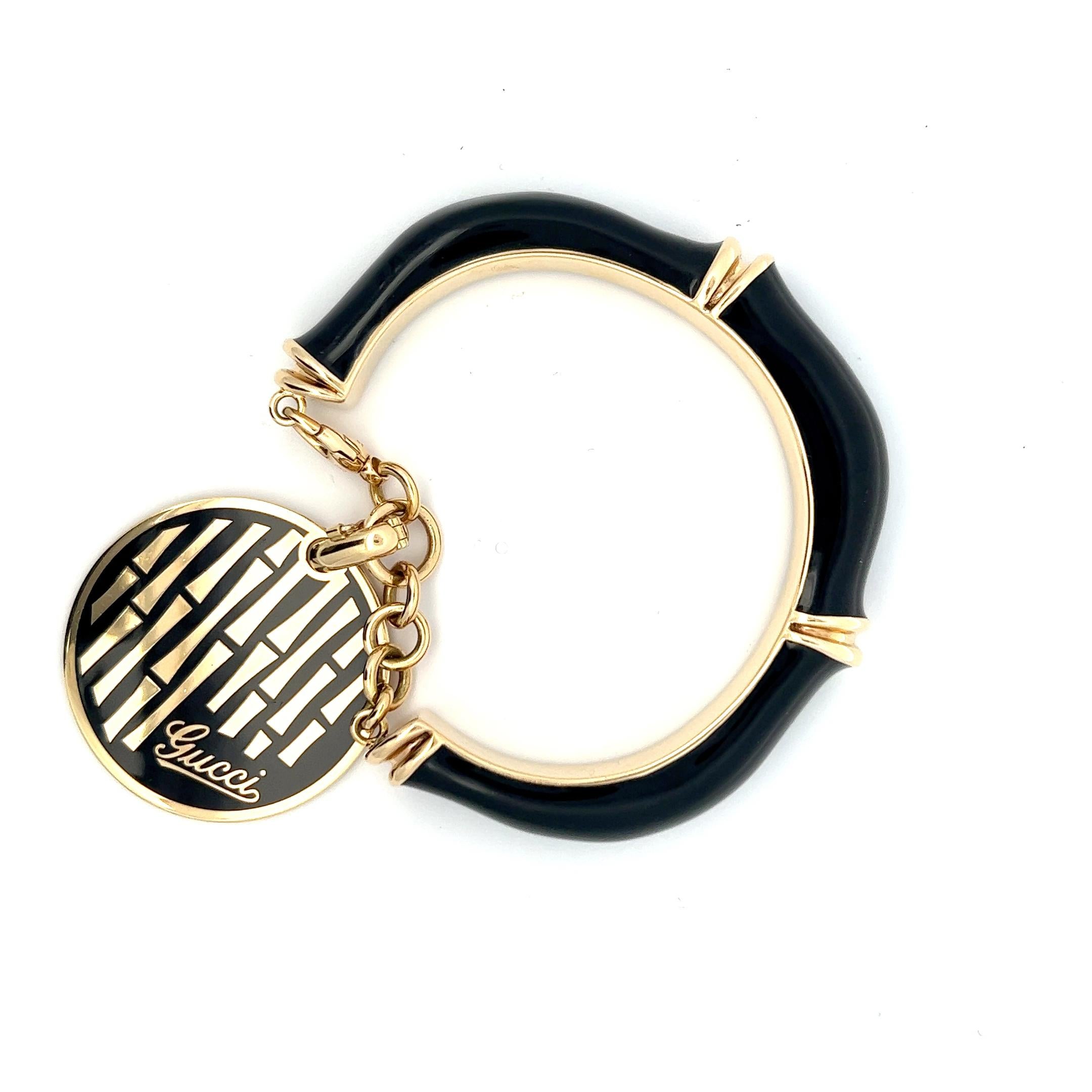 18k gold and black enamel bracelet by Gucci. In Good Condition For Sale In KERKRADE, NL
