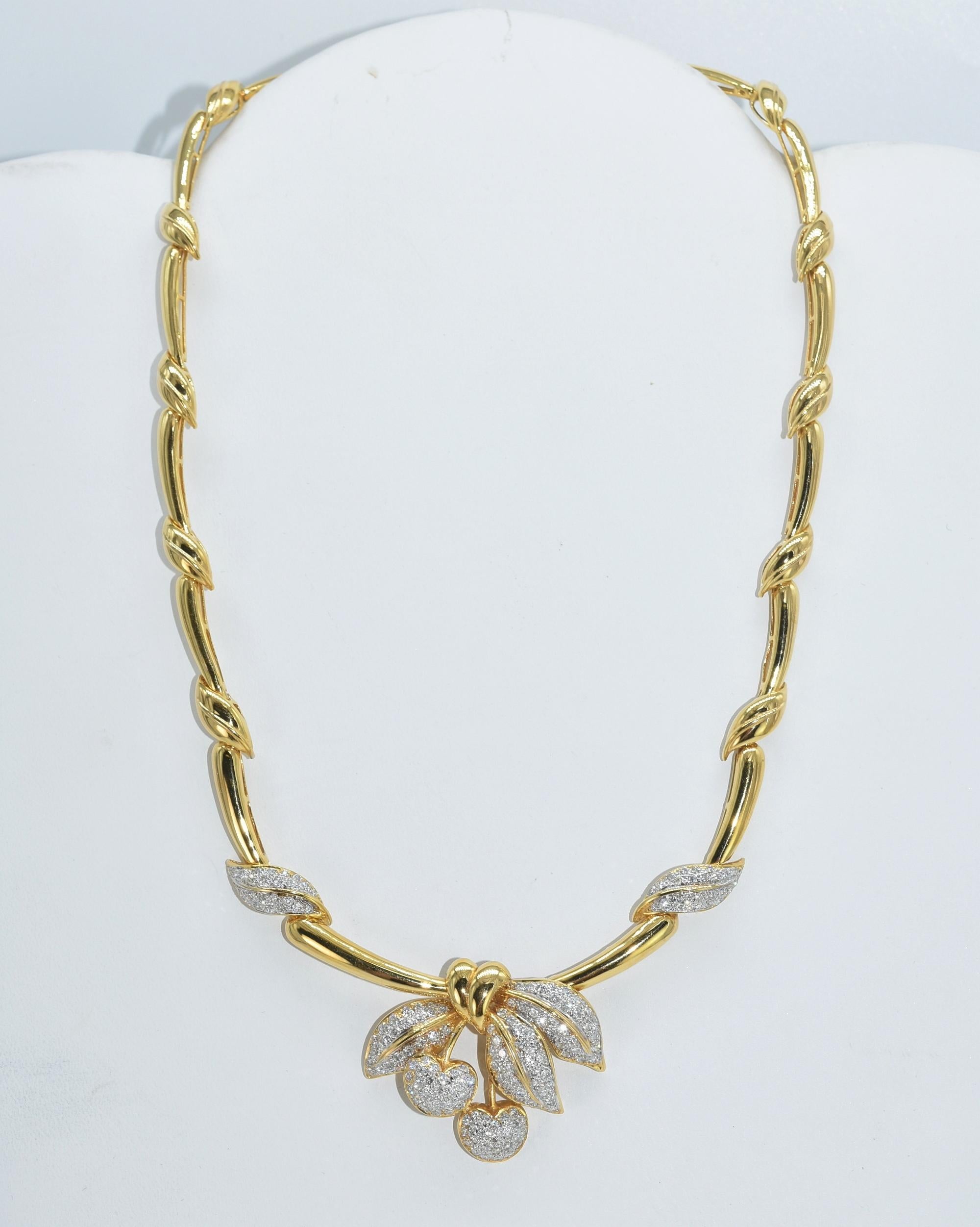 18K gold and diamond cherry cluster necklace. 18K yellow gold and 2.0 cttw diamonds, G-color, Vs-2, Si-1 clarity, in a Cherry Cluster with leaves as links, Stamped on back on cherries 