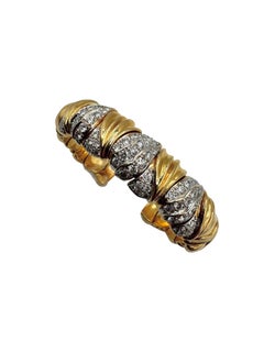 Bracelet manchette en or 18K et diamants, serti de pavés
