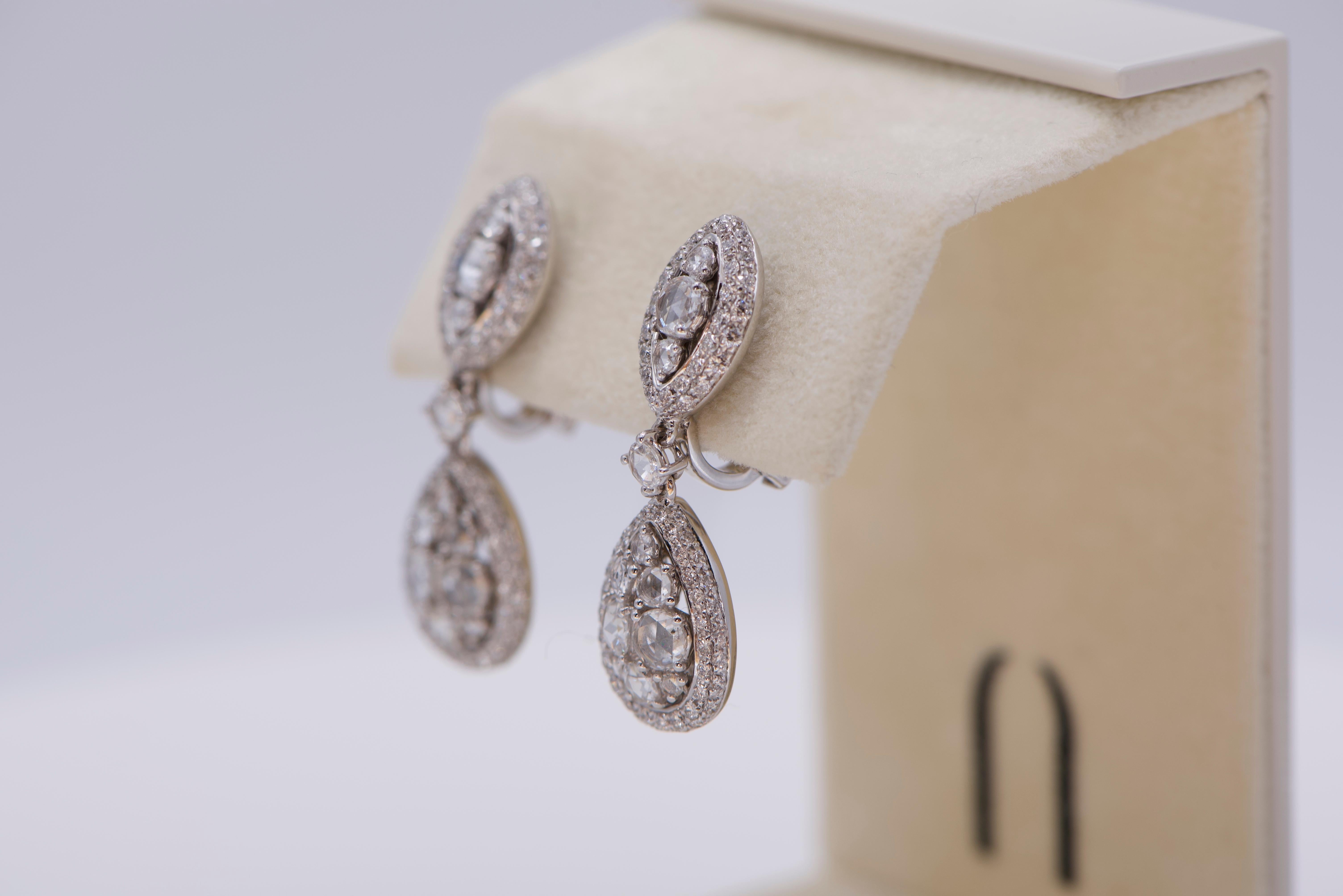 Earrings in 18K white gold with approximately 2.53 carats of white diamonds. 