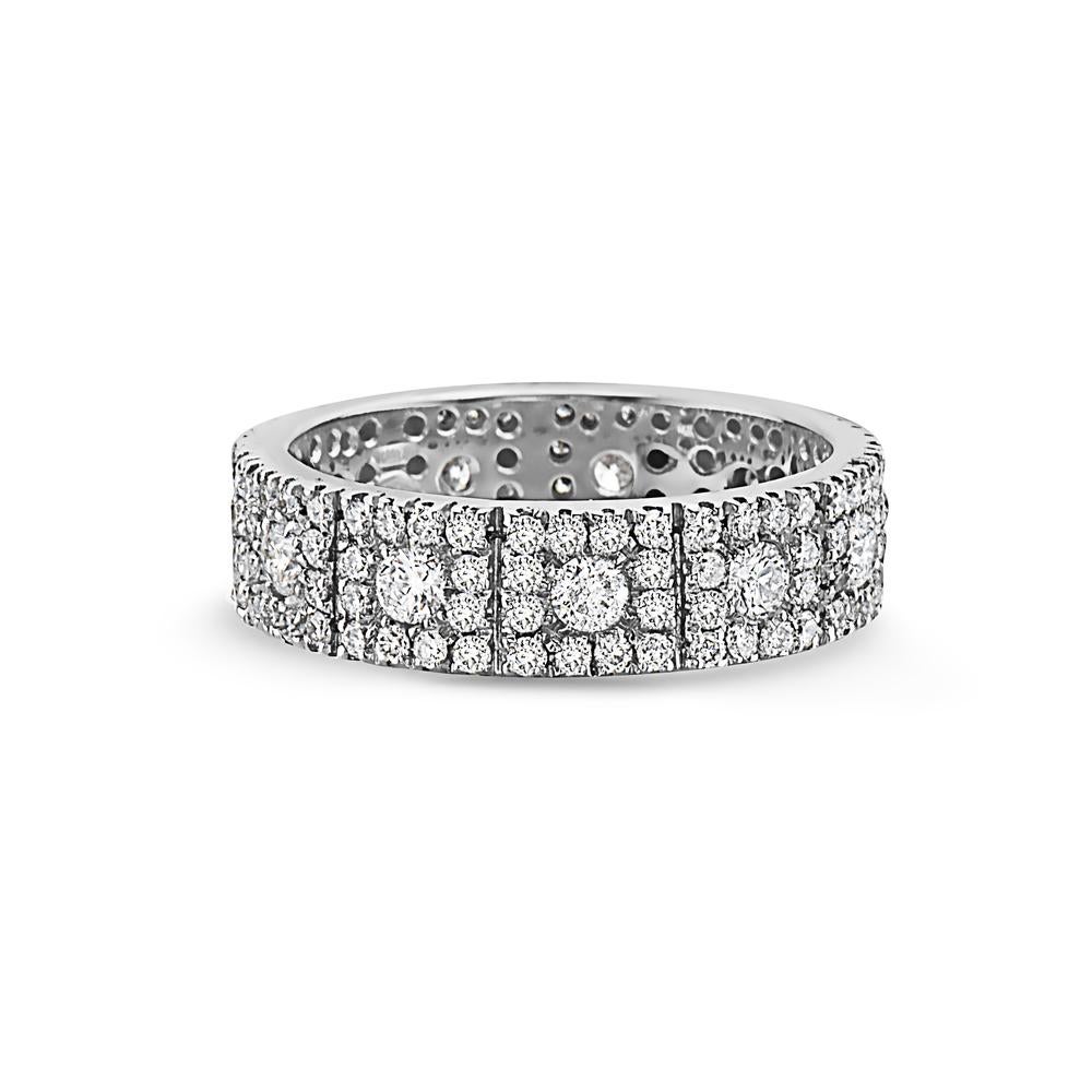 This wedding band features 1.98 carats of diamonds set in 18K white gold. 5.96 grams total weight. Made in Italy. 

Viewings available in our NYC showroom by appointment.