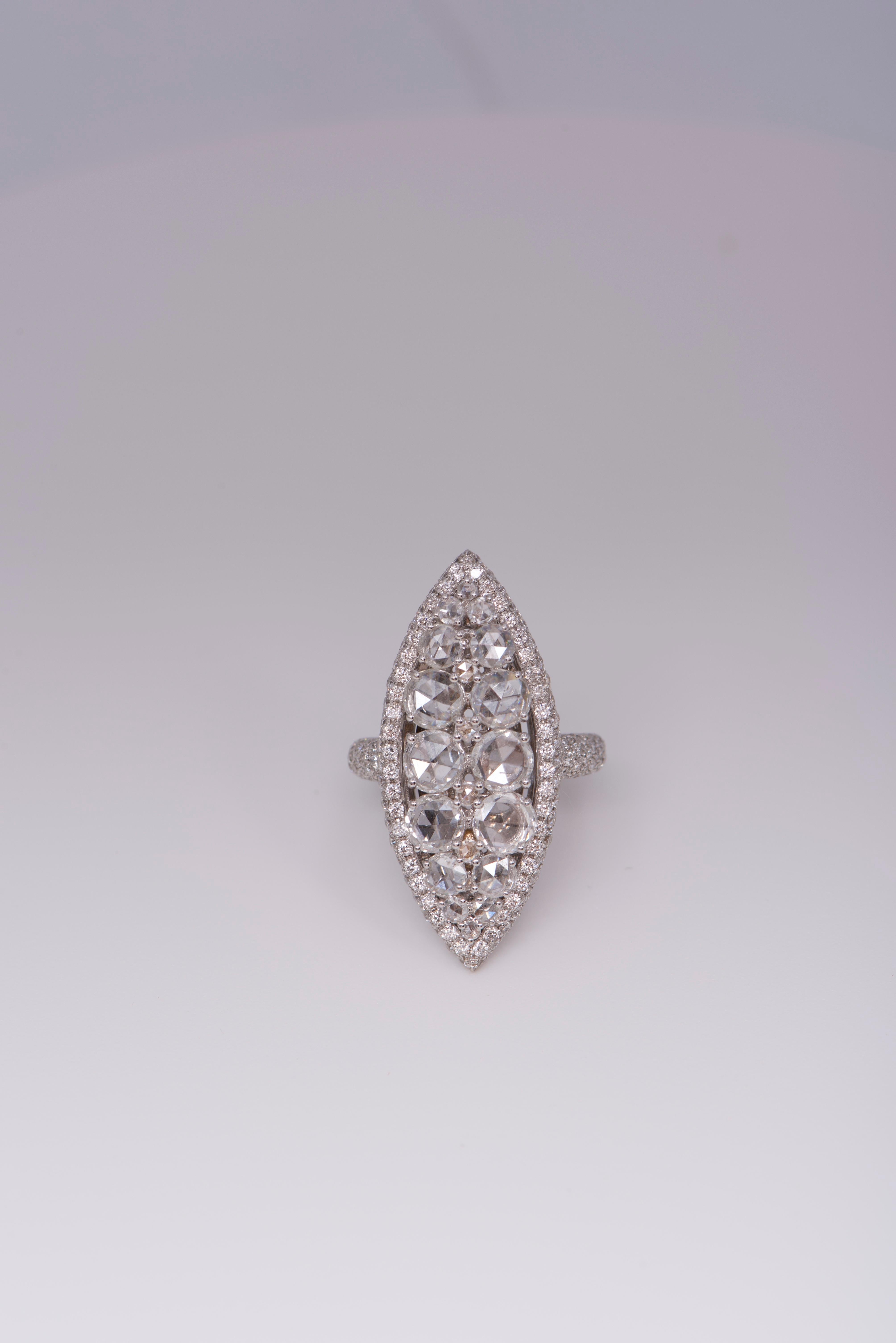 Adamas navette ring in 18K white gold with approximately 3.76 carats of diamonds in total. Diamonds are set in the center, along the border, and on the shank as well.  