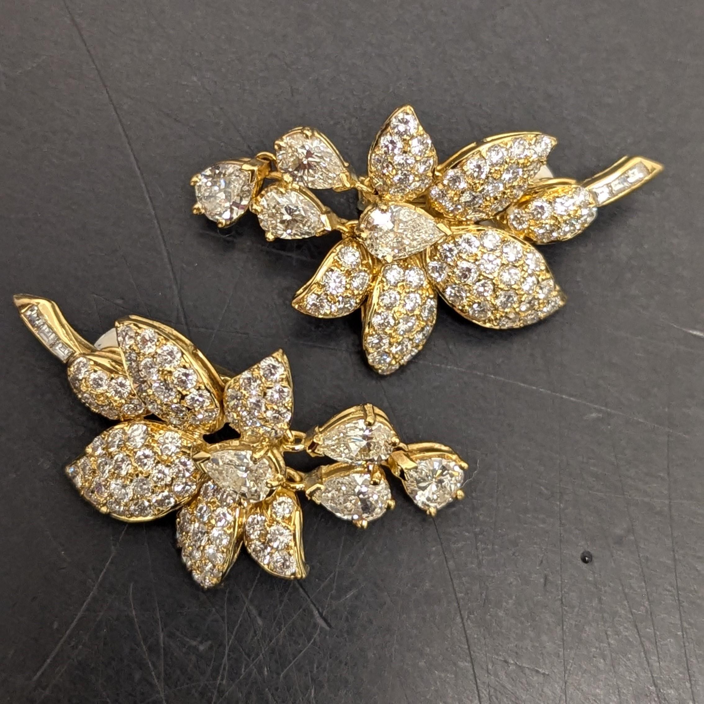 Crafted in 18k gold, these earrings feature 136 round, 6 square (approx. 5.75 cts.), and 8 pear-shaped diamonds (approx. 4.90 cts.). 