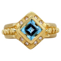 18K Gold and Diamonds Princess Cut Blue Topaz Ring