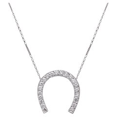 Collana con calzascarpe in oro 18k e diamanti