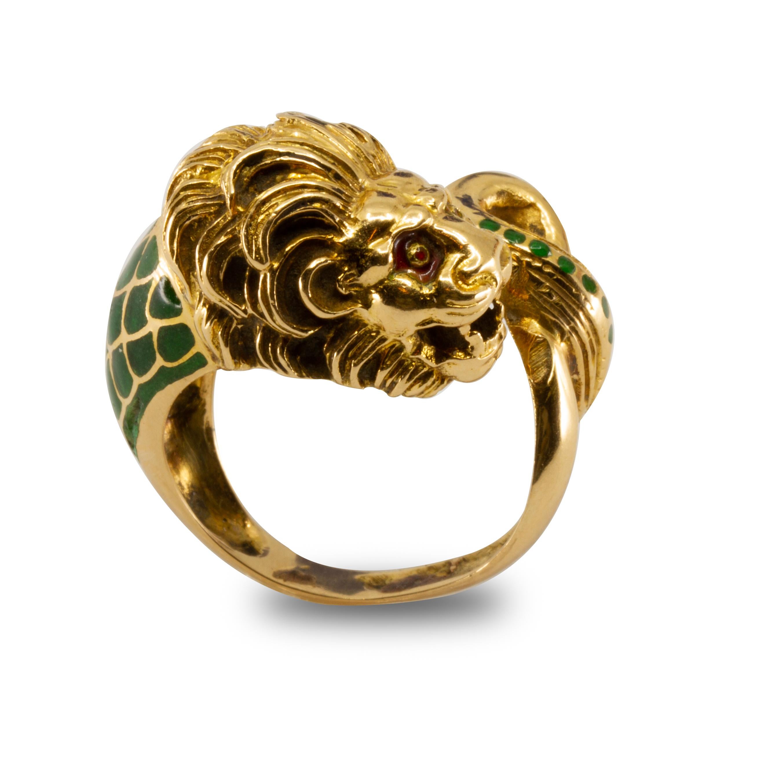 Offered is a beautiful vintage lion head ring made from 18K gold and green enamel as the mane and tail. We do not know who the maker is but we are sure it is Italian due to the style. It is a size 6.5