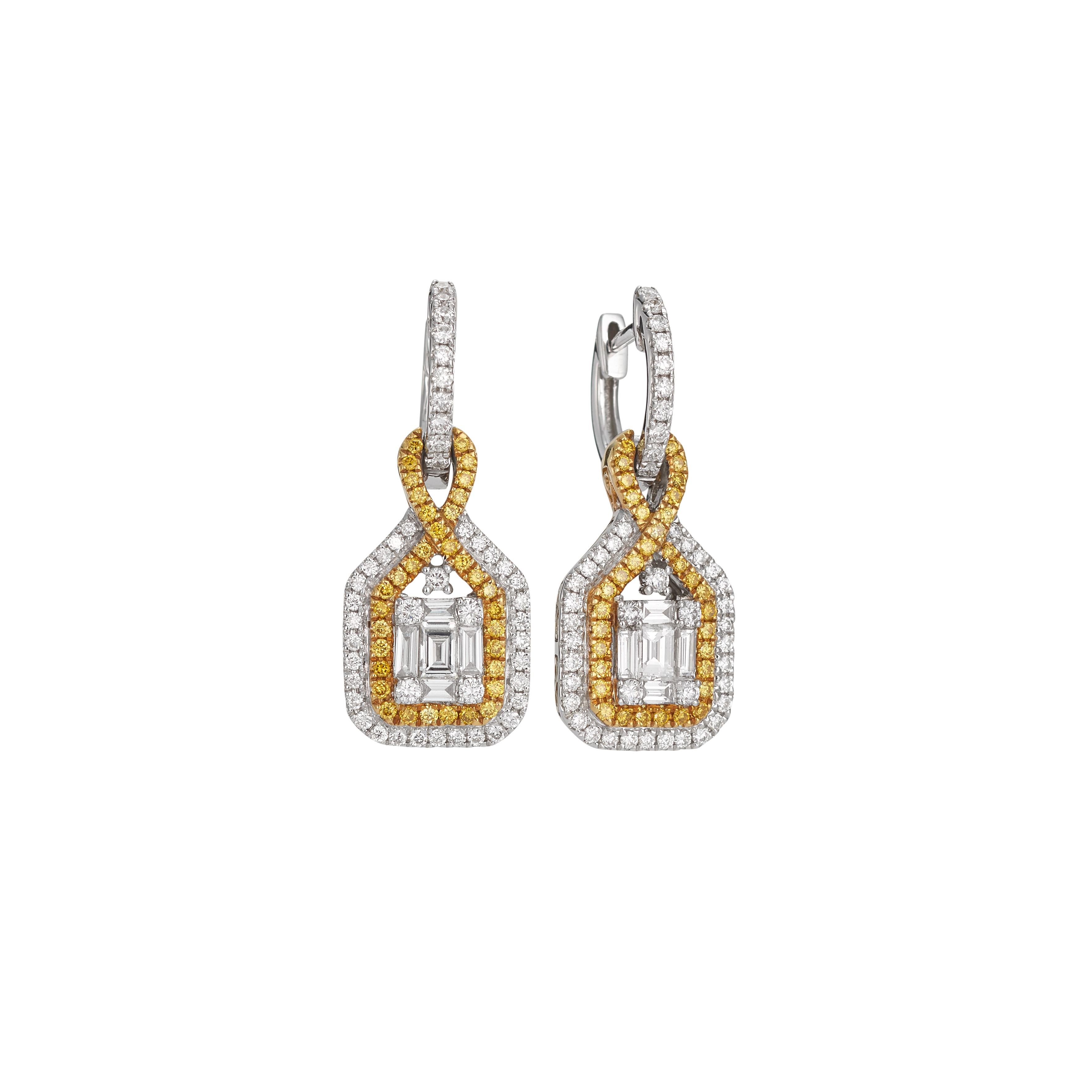 Beautiful drop earrings showcasing fancy yellow diamonds and white brilliant diamonds, set in 18k yellow and white gold. The yellow diamonds total .34 carats and the white diamonds total 1.03 carats.There are micro pave diamonds on the hoops.