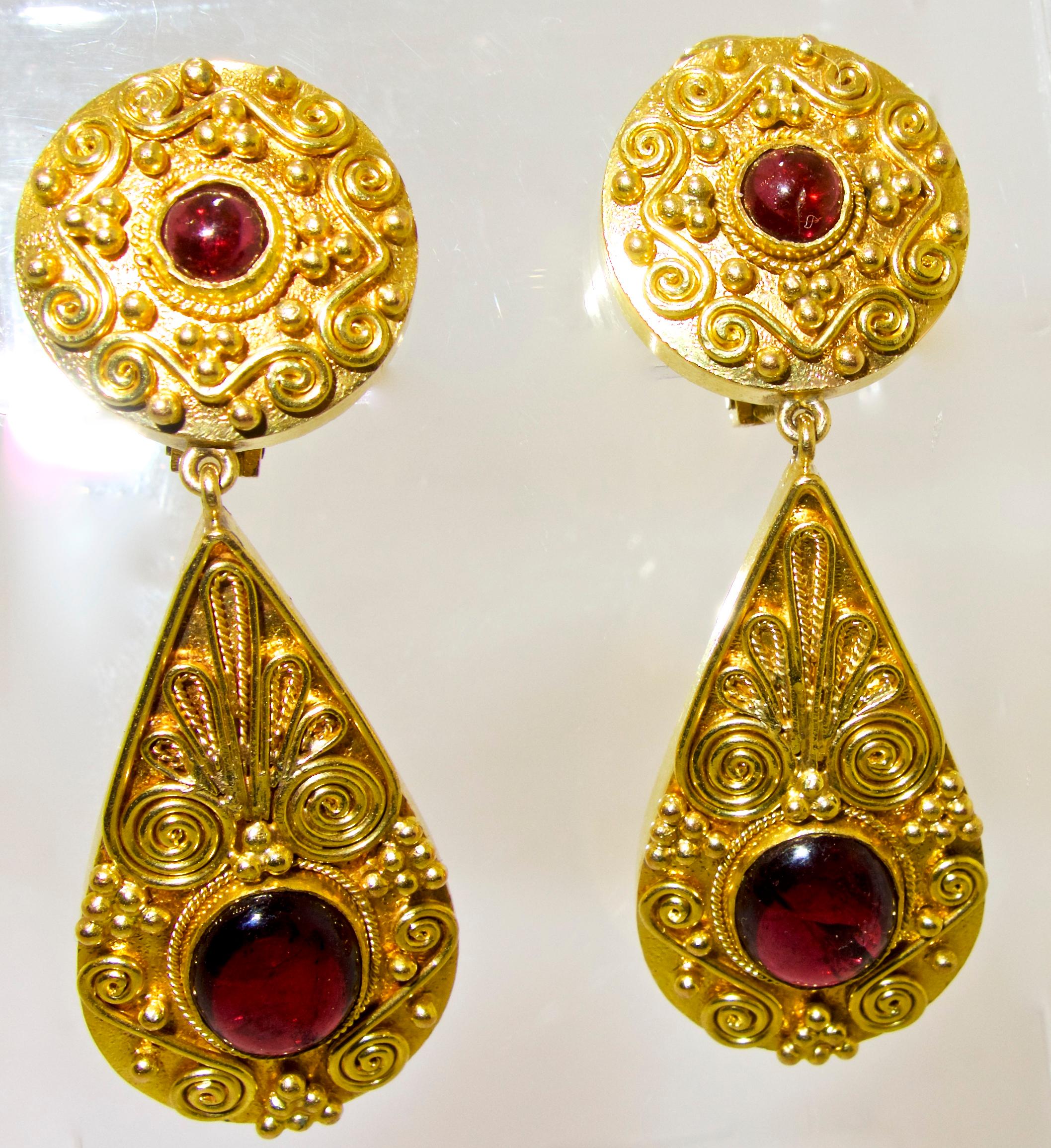 18K and 4 natural deep Burgundy garnet earrings which are highly decorated with bead and wire work, referred to as Etruscan Revival.  These earrings are easy to wear and now for a non pierced ear but can easily be converted to accommodate a pierced