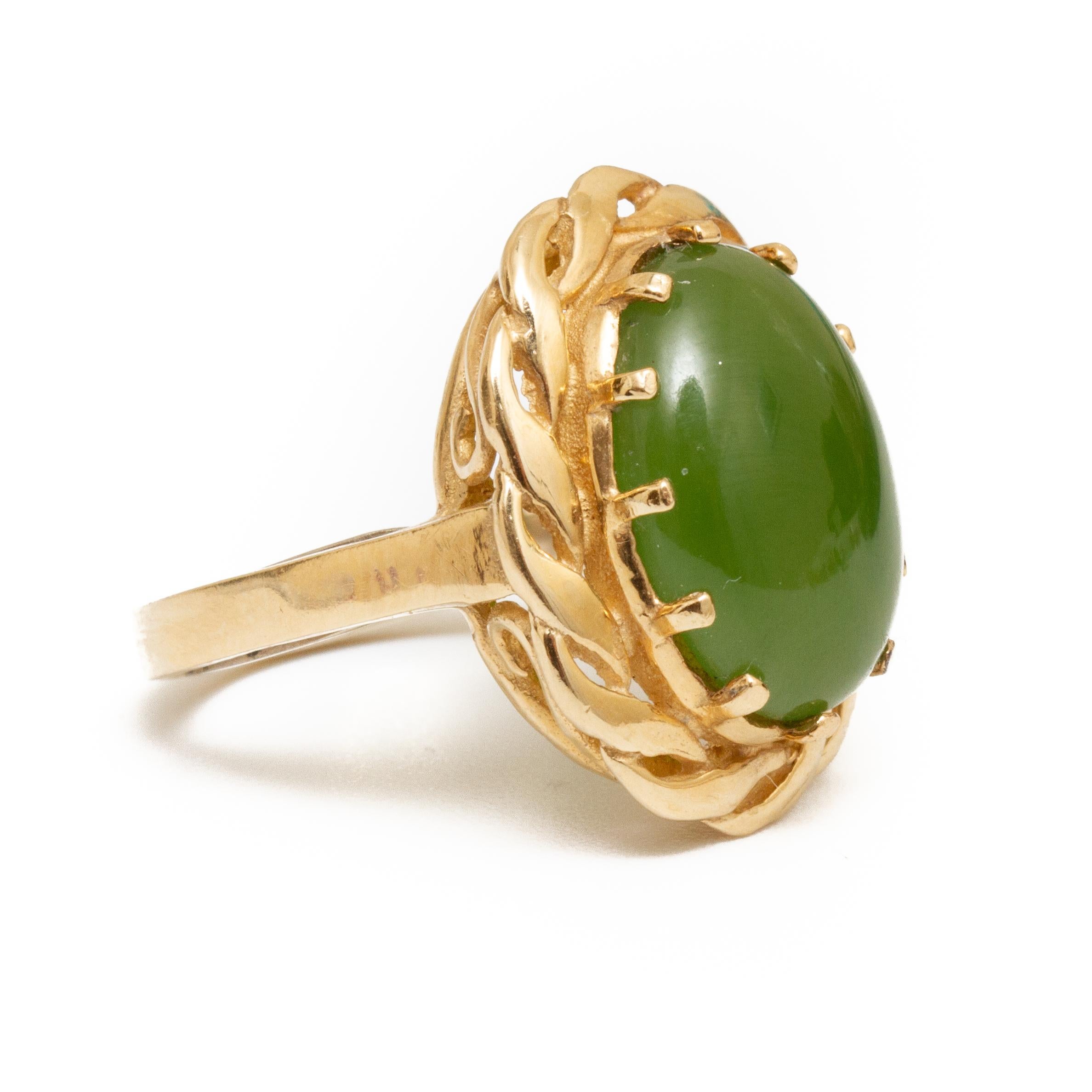 18K gold and jade ring size 4.75. Ring has guard, weighs approx. 3.8 dwt