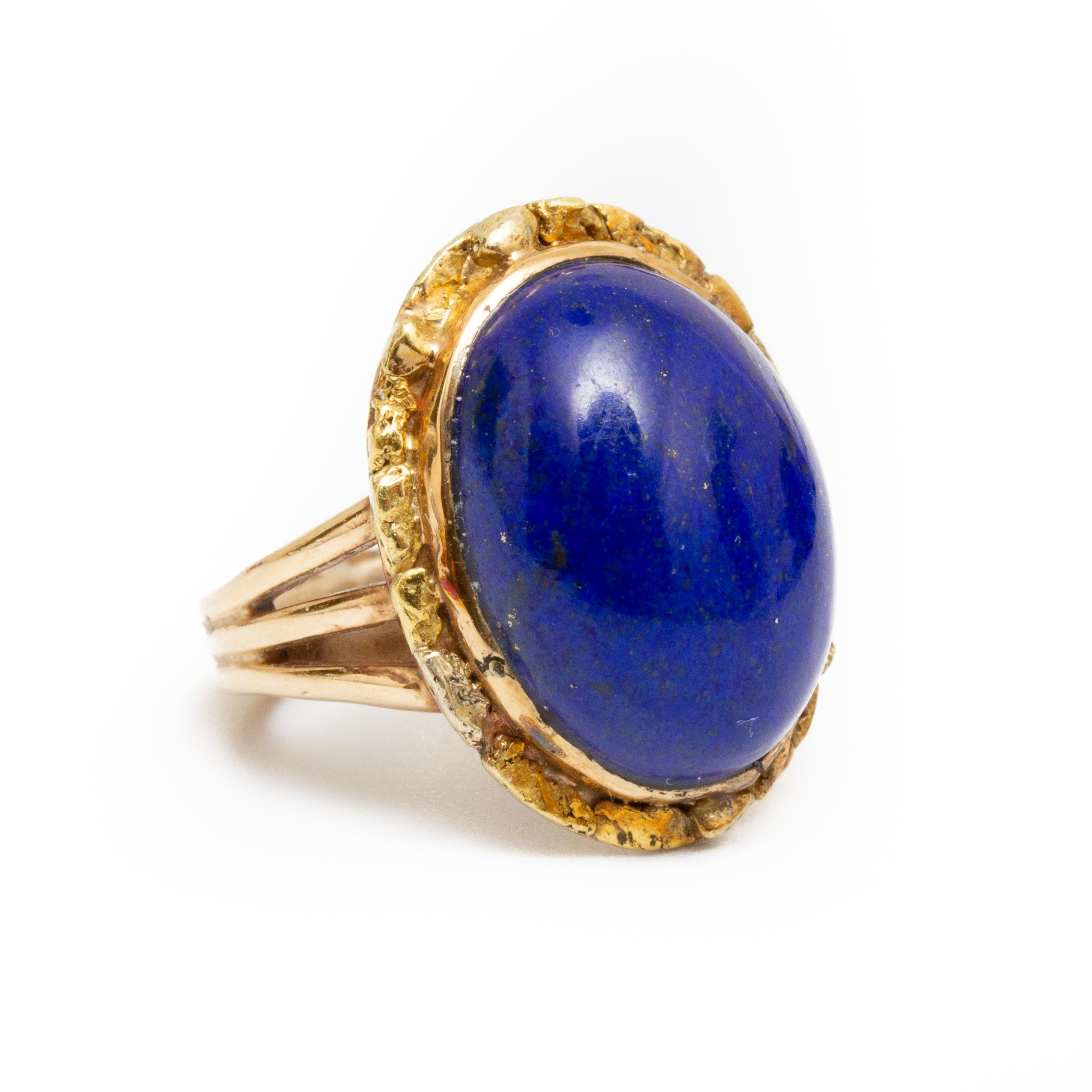18k gold and lapis lazuli ring size 7. 4.8dwt The ring has a retainer From the Broussard estate noted jewelry collection Park Avenue New York