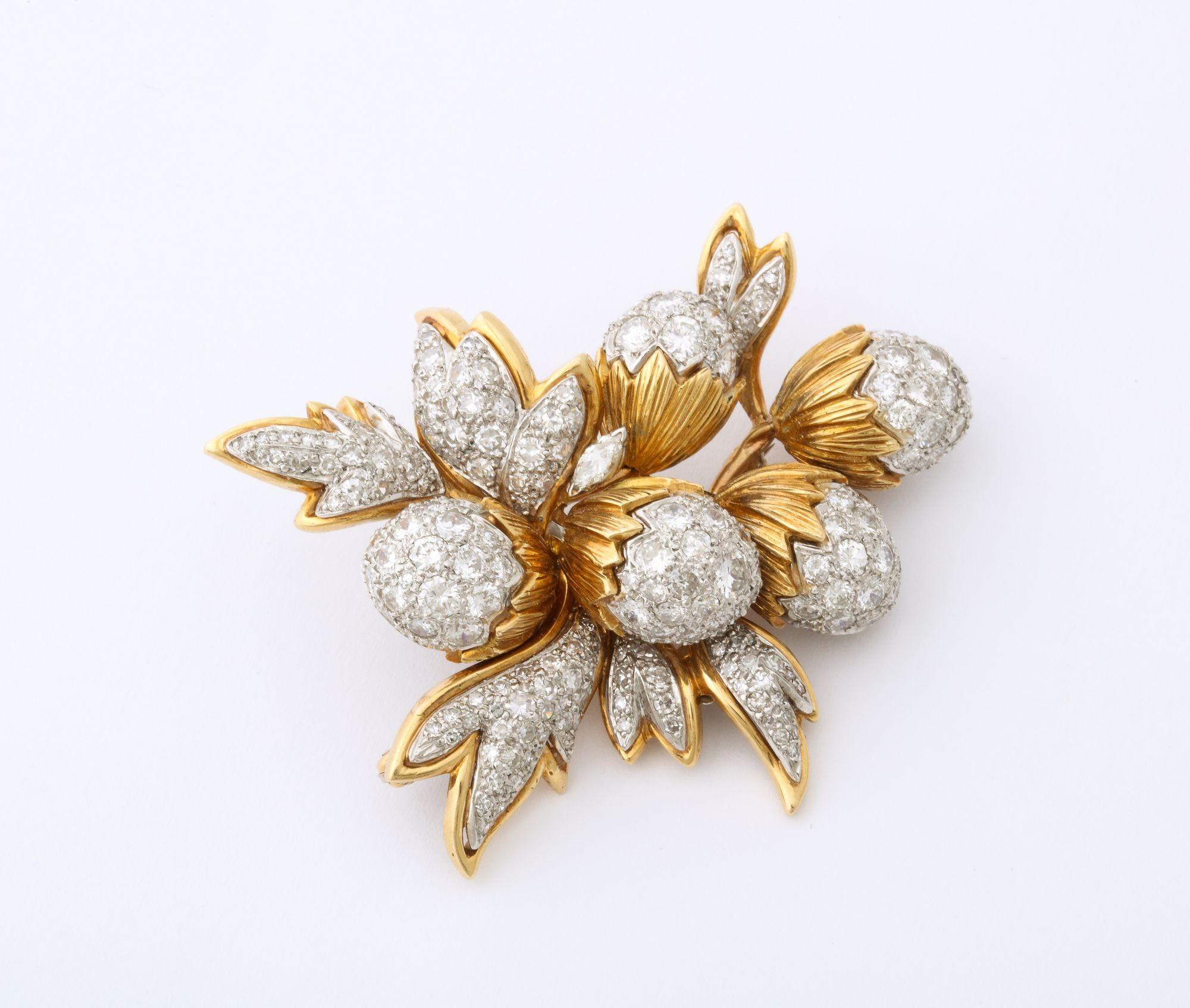 A vintage 18K Gold Brooch with Diamond Acorns and Leaves