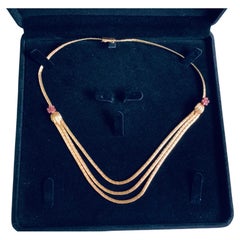 Collana in oro 18K e rubini