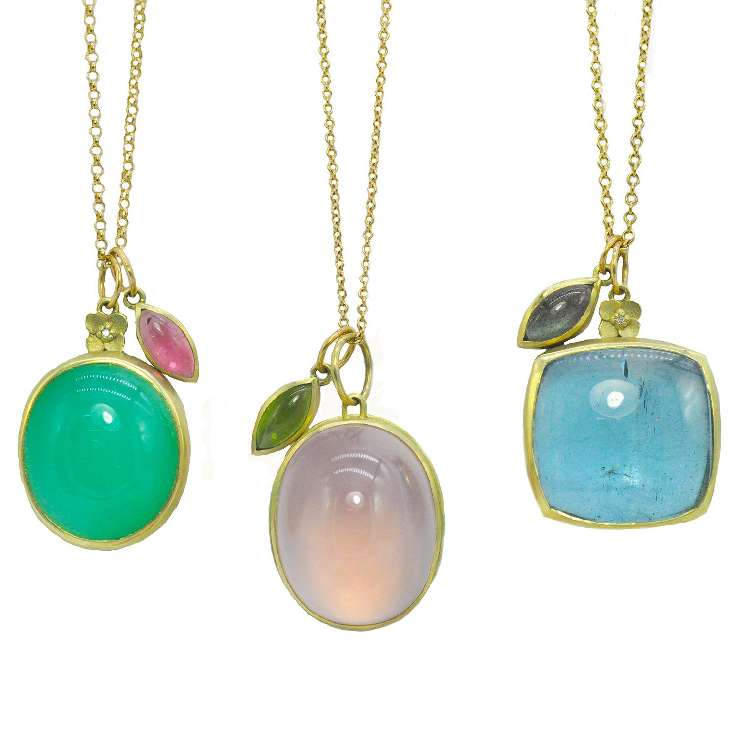 You'll love this colorful charm necklace with designer flair! This botanical gemstone necklace is comprised of a large square aquamarine pendant set in 18k gold with a sweet diamond hydrangea flower topper, paired with a luminous marquis labradorite