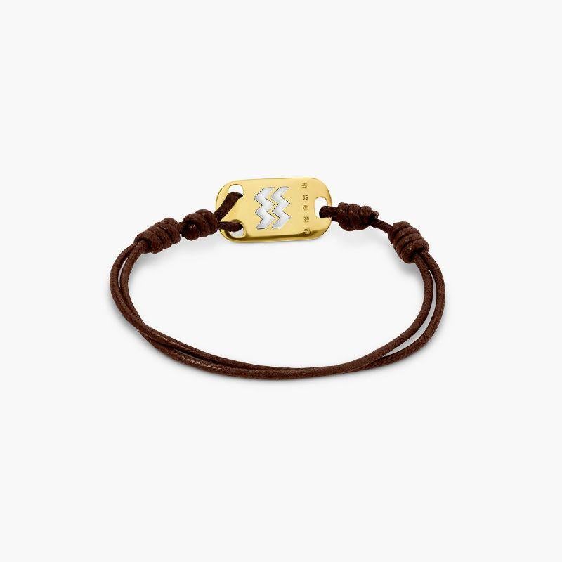 18K Gold Aquarius Bracelet with Brown Cord

Celebrate the Aquarius in your life with this timeless cord bracelet featuring a gold star sign tag for a personal touch. Whether it's for yourself or a birthday gift, the effortless style can be worn for