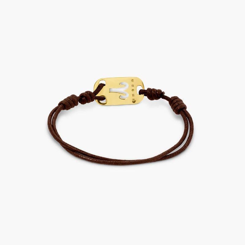 18K Gold Aries Bracelet with Brown Cord

Celebrate the Aries in your life with this timeless cord bracelet featuring a gold star sign tag for a personal touch. Whether it's for yourself or a birthday gift, the effortless style can be worn for any