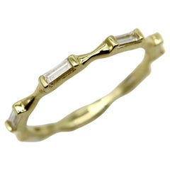 Bracelet éternel en or 18K avec diamant baguette 