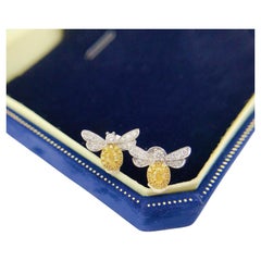 Clous d'oreilles d'inspiration abeille en or 18 carats avec diamants jaunes naturels