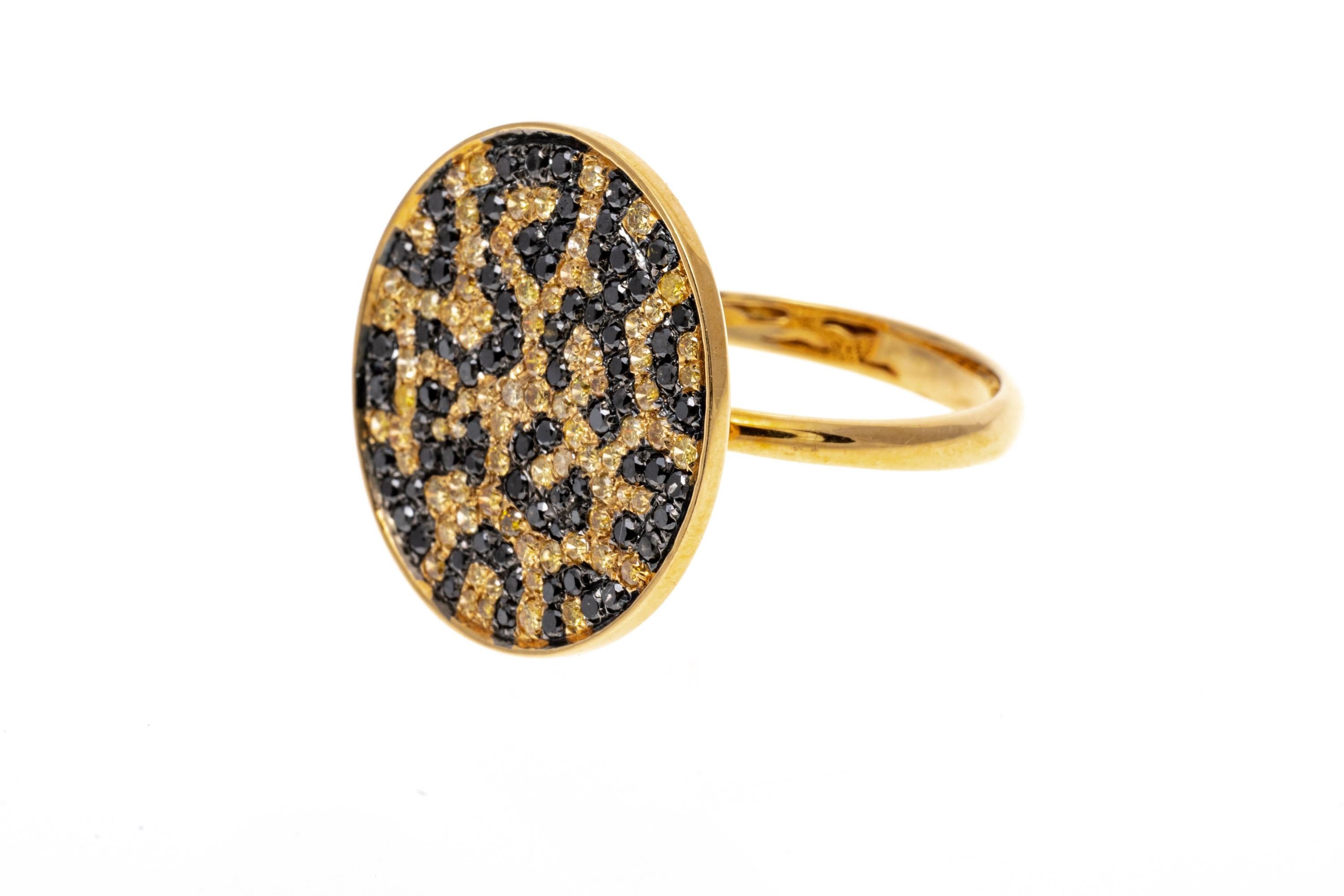 18k yellow gold ring. This fabulous mod ring is contemporary round disc top ring, pave set with round faceted black diamond 