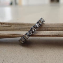 18k Gold, Black Rhodium, Eternity Band is Bezel Set with 1.02 carat of Diamond