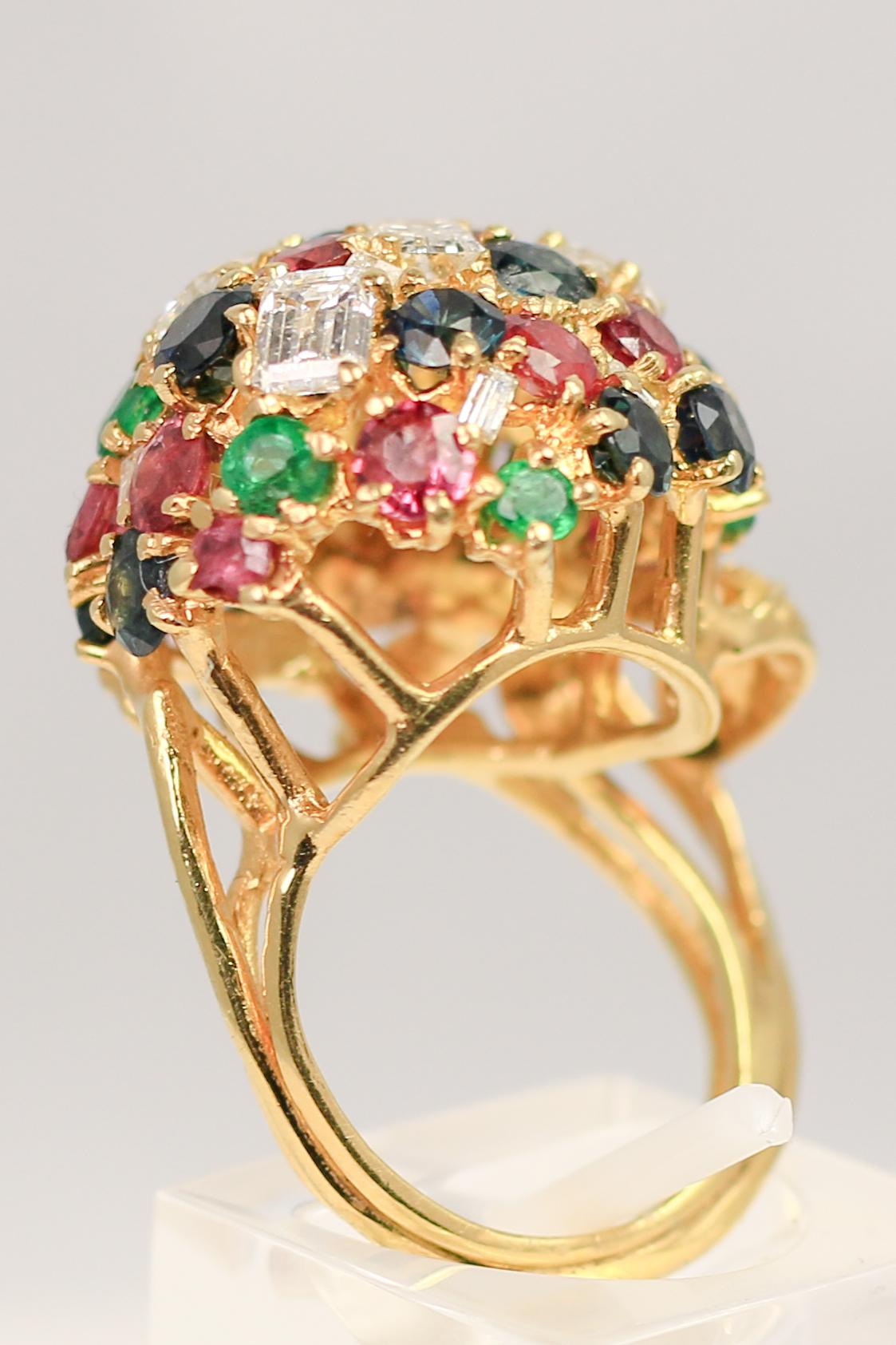 This 18k gold ring is packed with 1.20cts of Diamonds and 3.5cts of color. The ring, designed to resemble a blackberry, is a statement piece, perfect for the lively gal looking to celebrate and revel in the fruits of life with an elegant statement