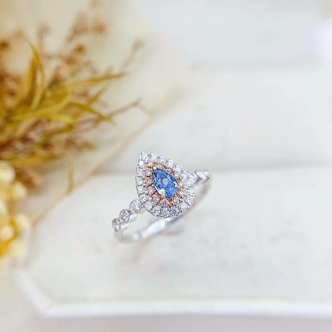 18K Gold Blue Diamond Ring with Diamonds

Blue Diamond - 0.27 CT
Diamonds - 0.36 CT

Total Weight - 2.65 GM