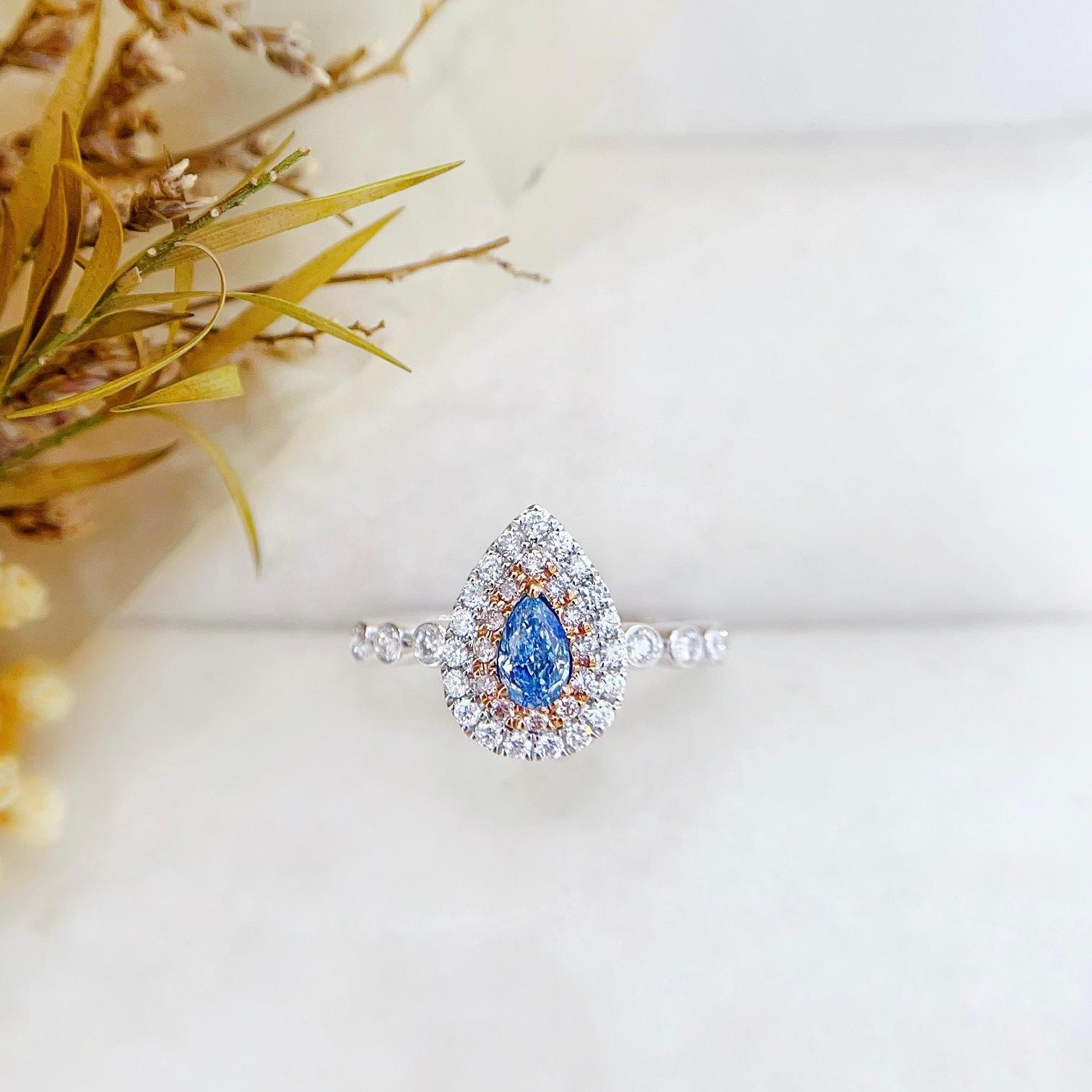 Pear Cut 18K Gold Blue Diamond Ring with Diamonds For Sale