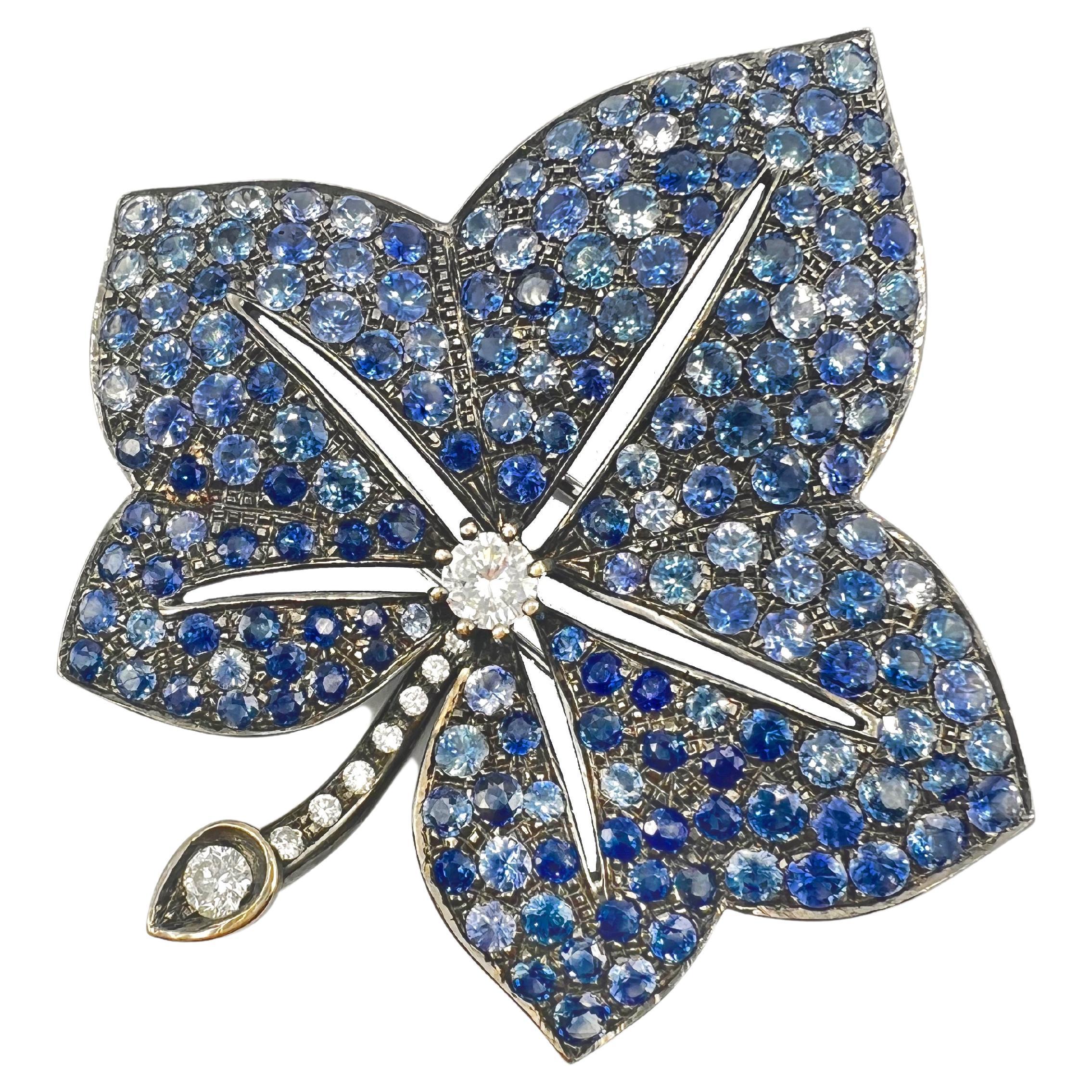 Broche feuille en or 18k saphir bleu et diamant