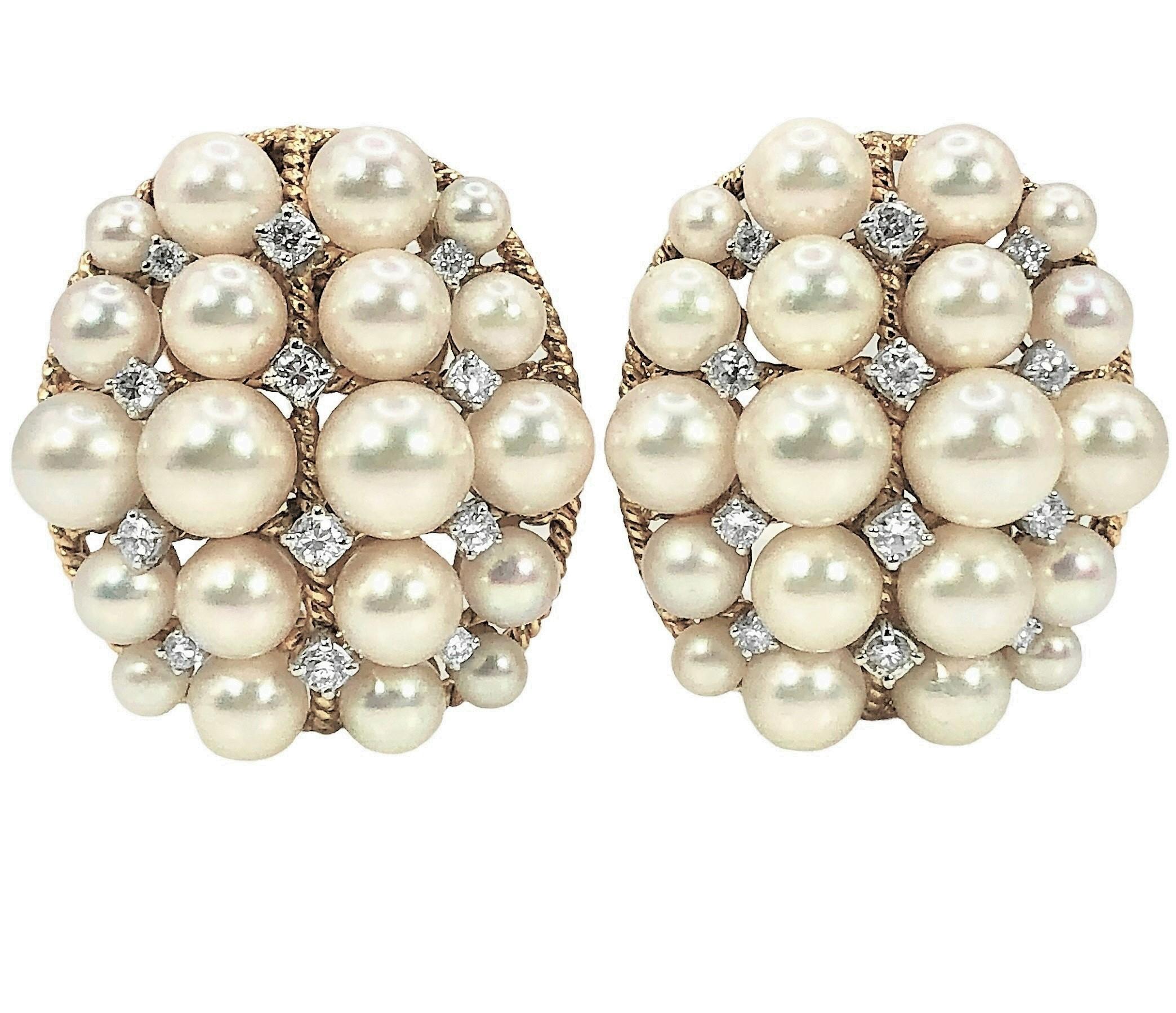 This classic pair of 18k gold, Akoya pearl and diamond earrings was crafted, presumably in Italy, and then imported and sold in France during the middle of the 20th century.  Each oval shaped earring measures 1 1/4 inches by 1  1/8 inches and is
