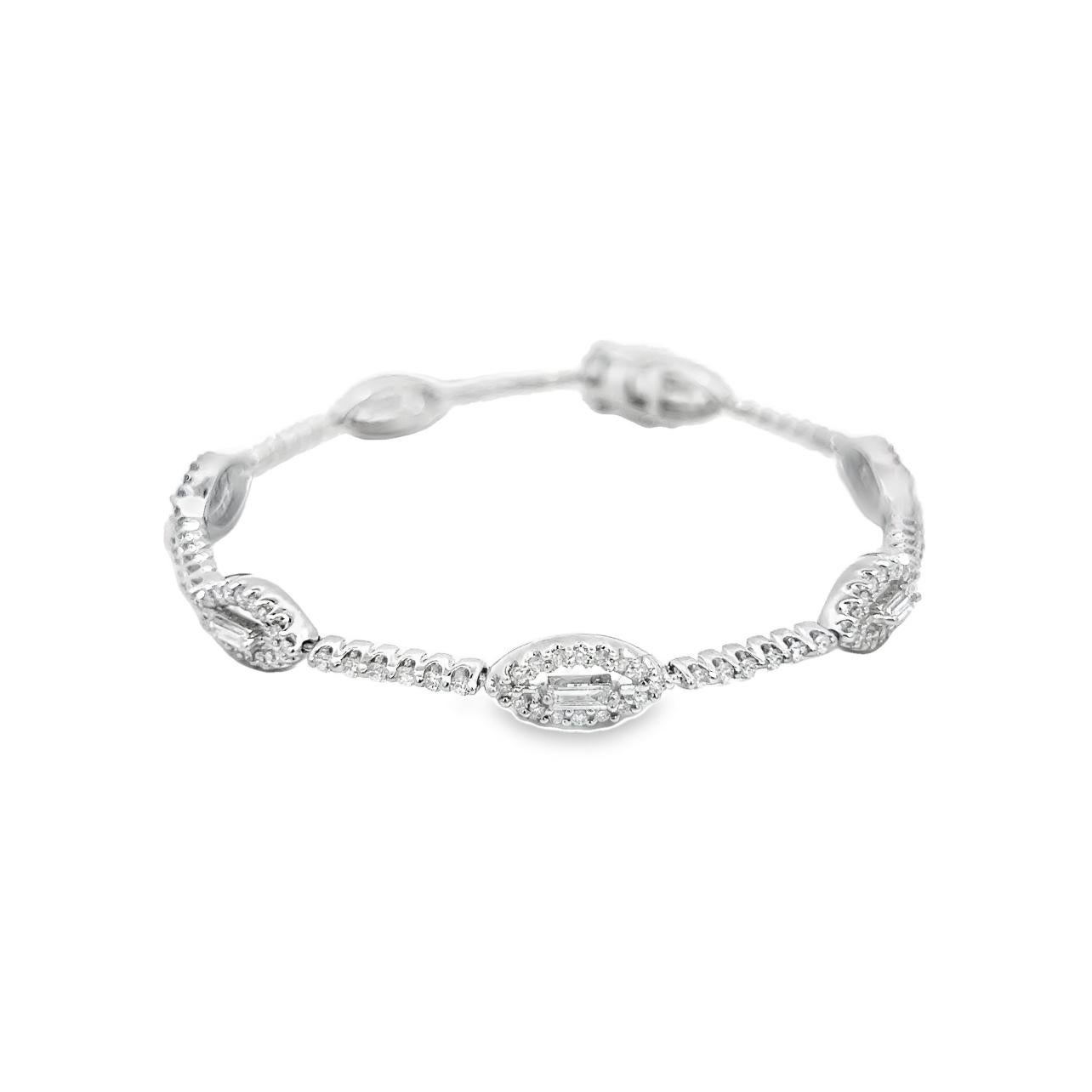 This beautiful unique piece of jewelry features 2.35 Total Carats Weight of Round Brilliant and Baguette shaped Diamonds. All of our items are carefully crafted in 18K White Gold (12.39g) 

                                        Exclusively Made in