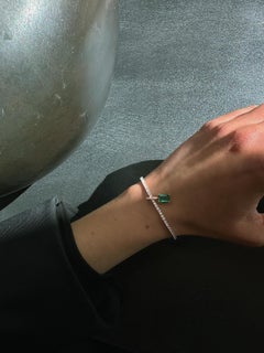 Bracciale in oro 18k con diamante smeraldo e pavé di diamanti