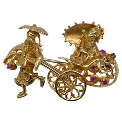 18 Karat Gold Brosche Rickshaw Design mit 4 Rubinen