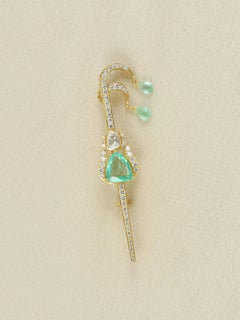 18K gold Brooch with columbian emeralds and full cut natural diamonds