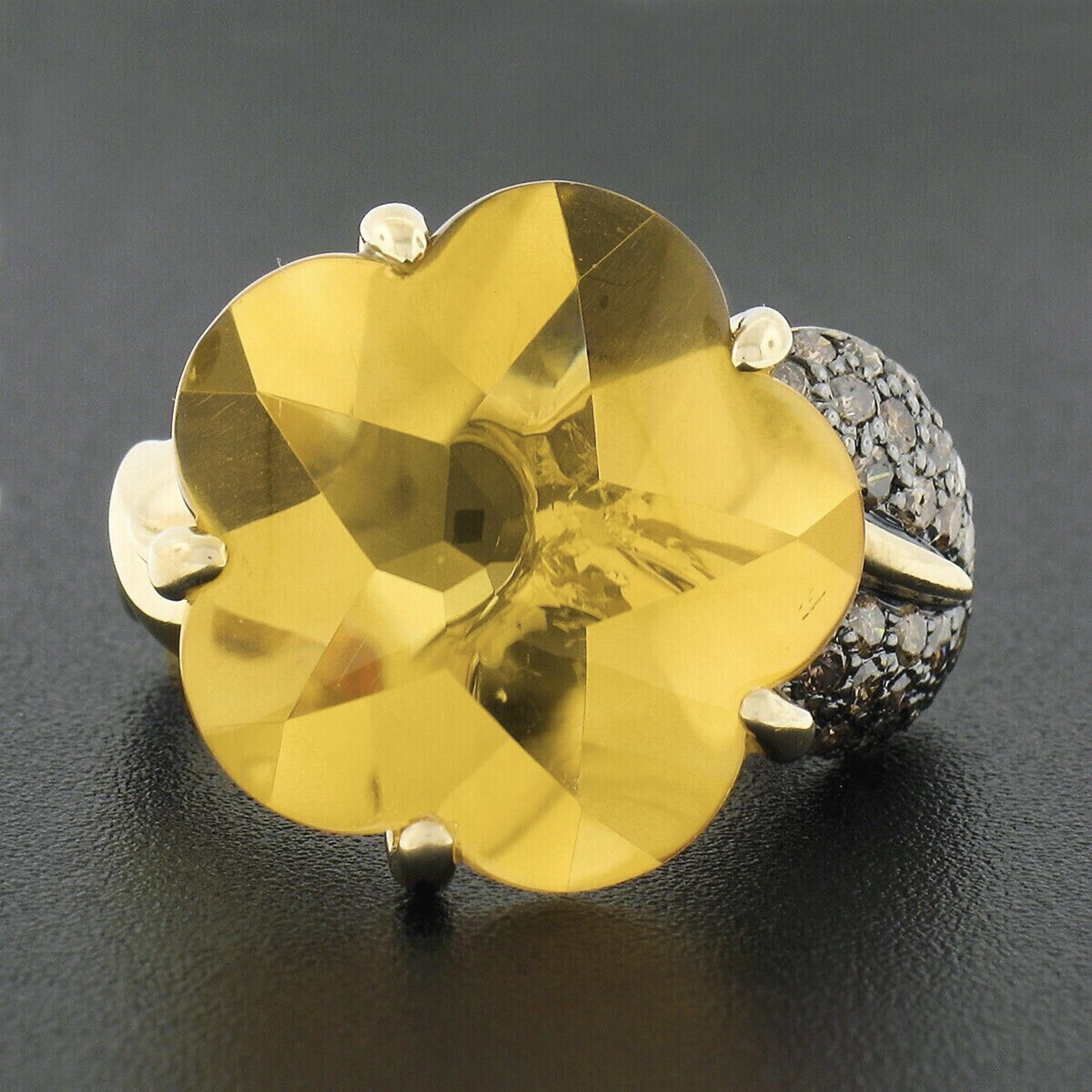 Here we have a fancy and absolutely magnificent cocktail ring that is crafted from solid 18k yellow gold featuring a beautiful flower and leaf design set with a very fine quality citrine and fancy brown diamonds throughout. The large and chunky