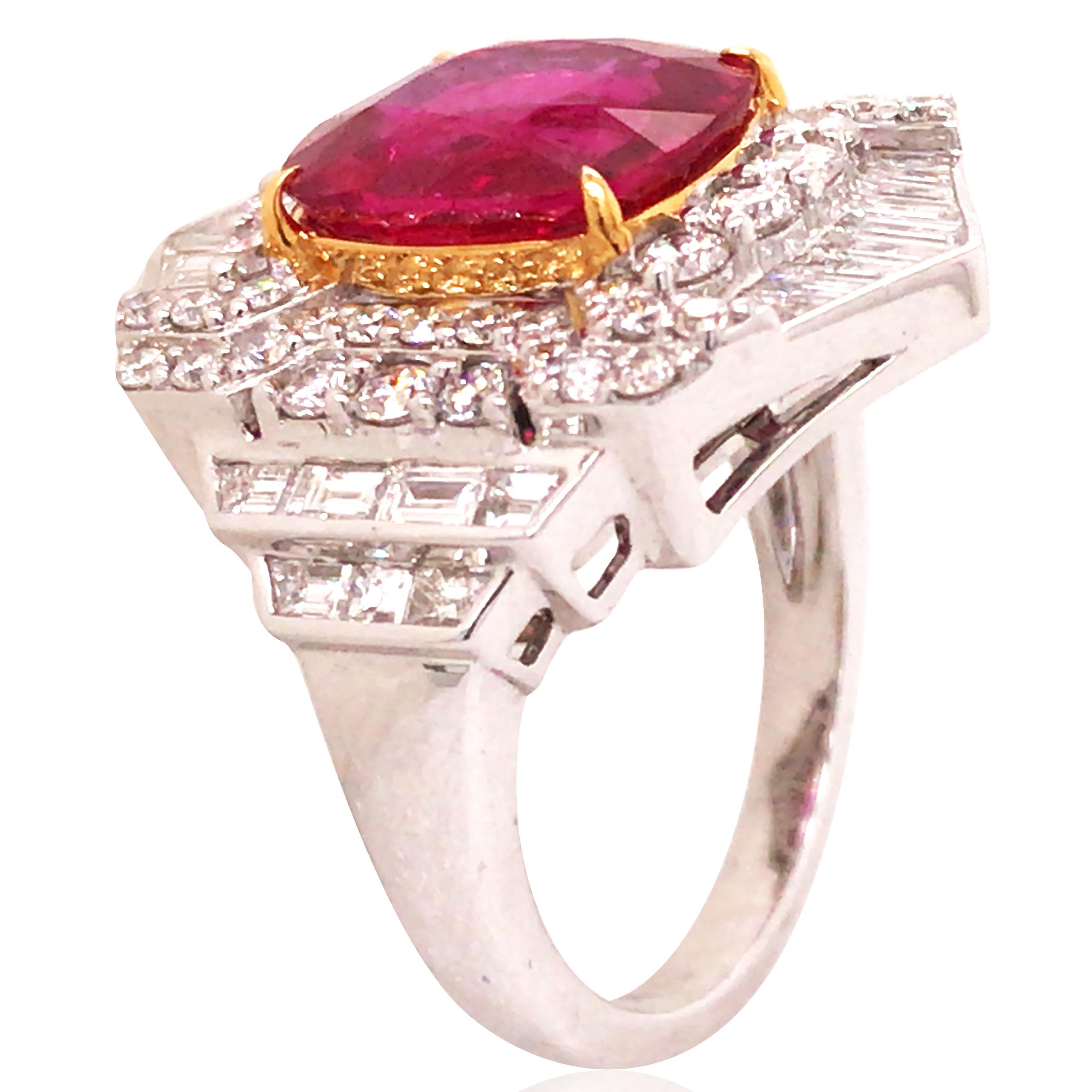 One cushion mixed cut ruby measuring 10.66 x 10.16 x 3.30mm, 4.23ct. 34 tapered baguette and 48 round brilliant-cut diamonds total approx. 1.55ct. Ring size: 6.5. Accompanied by an AGL certificate stating that the ruby is of Burma origin with no